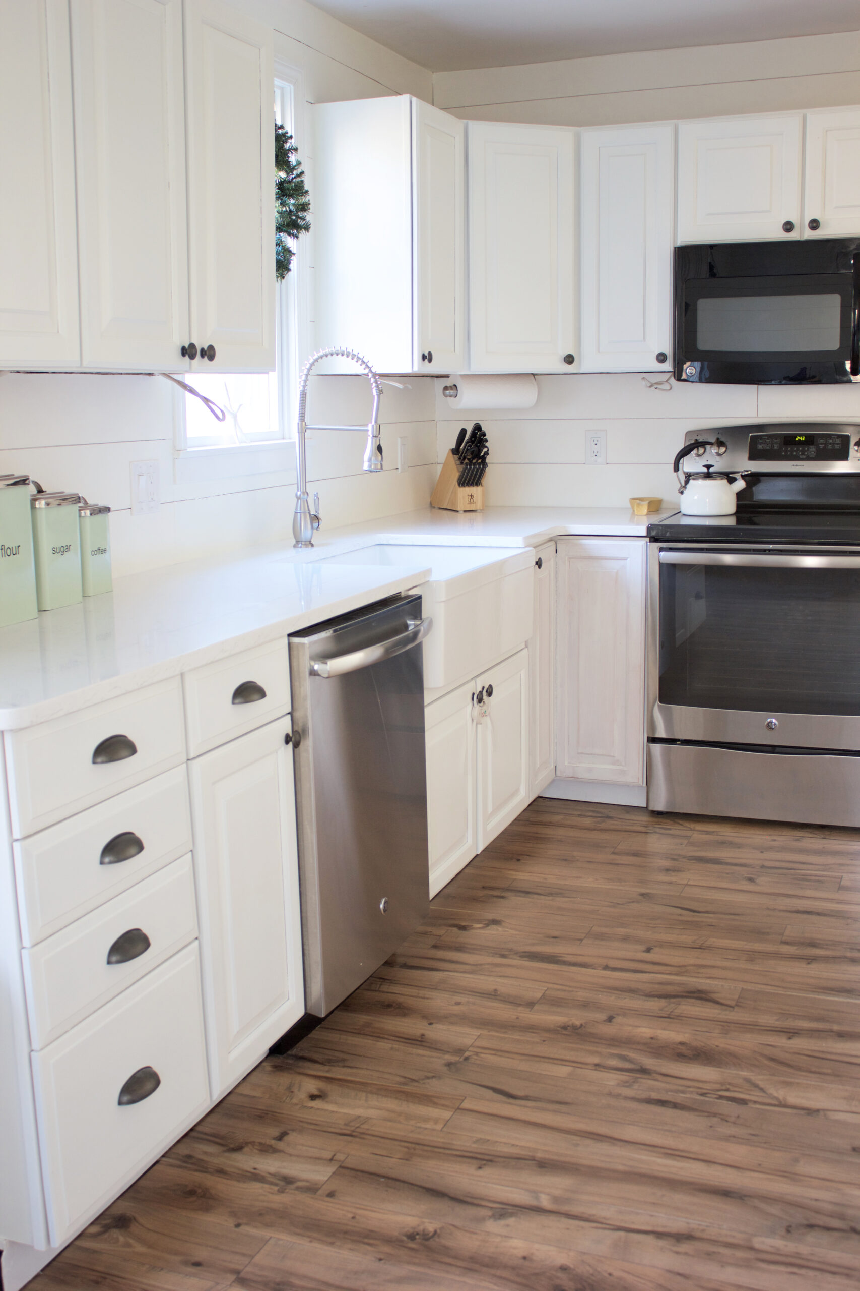 Kitchen Progress: Pergo Flooring Before and After - Lauren McBride