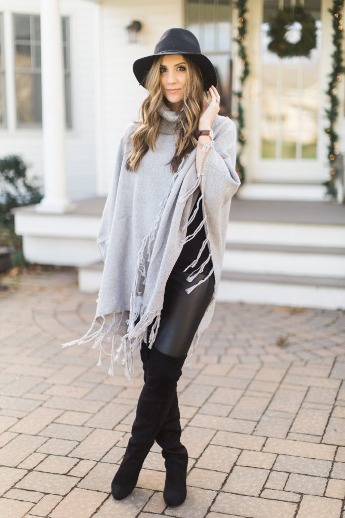 Bohemian inspired winter style with a fringe poncho, leather leggings, and black Steve Madden Gorgeous over the knee boots.