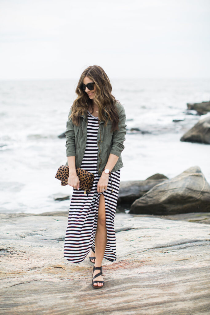 Striped maxi dress styled with a cargo vest for spring