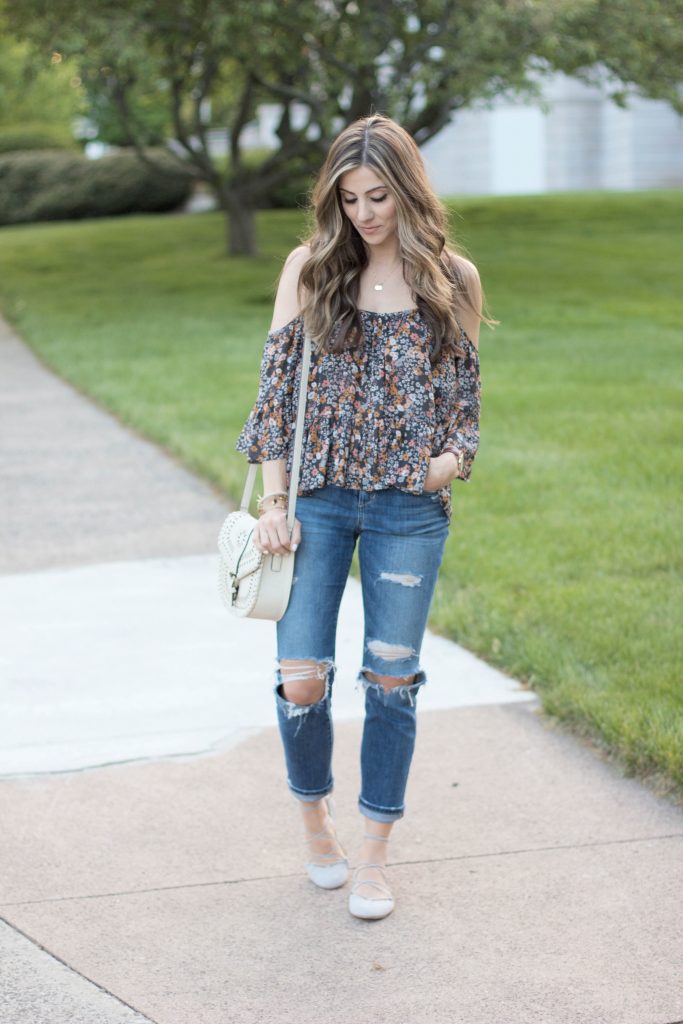 Spring styling this floral cold shoulder top with the perfect pair of distressed denim and gray lace-up flats.