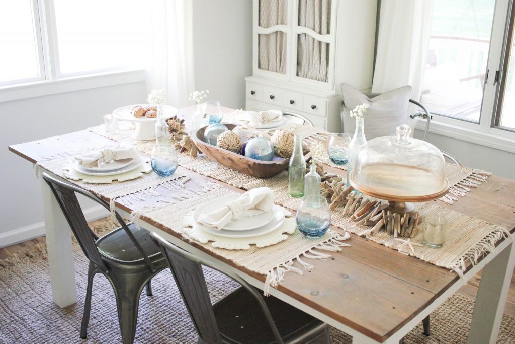 A coastal farmhouse summer tablescape featuring Pier 1