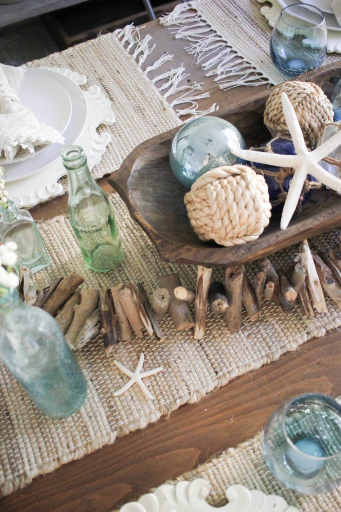 A coastal farmhouse summer tablescape featuring Pier 1