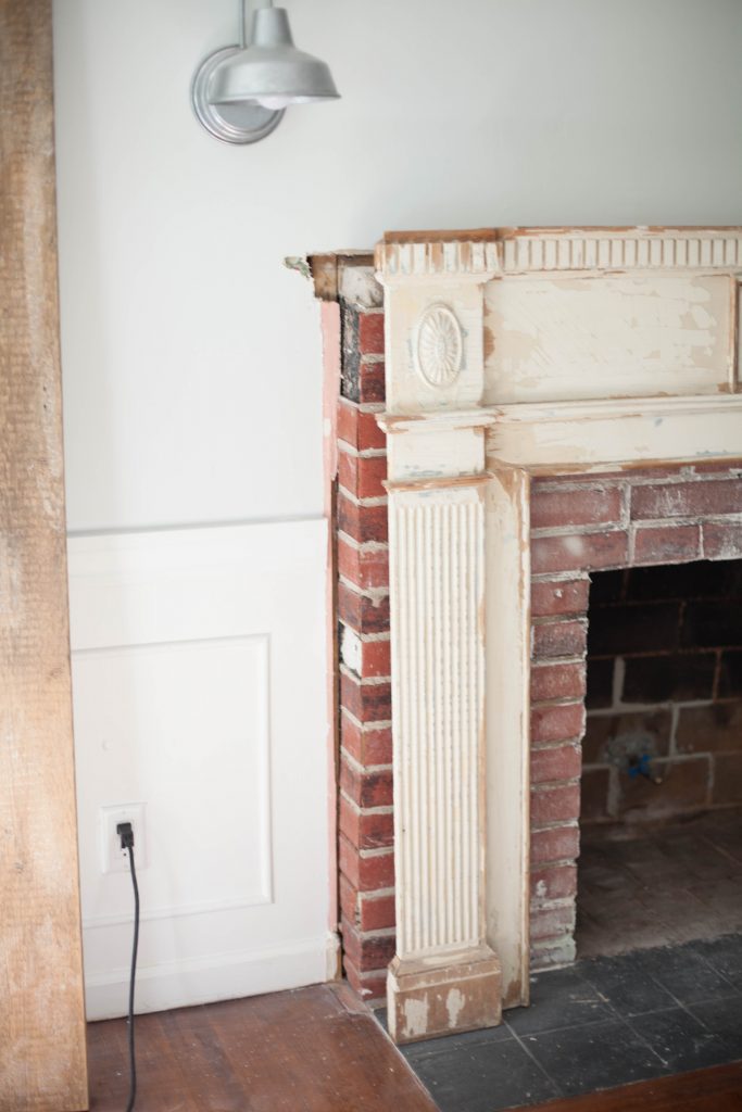 Our process for how to mount an antique mantle to our fireplace to add an antique flare to our living room.