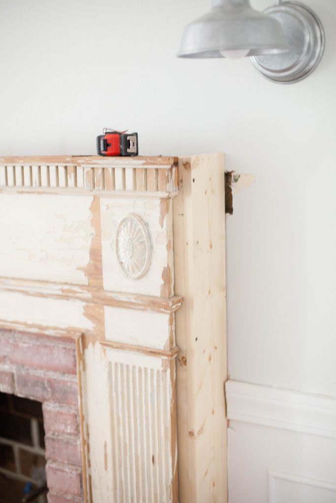 Our process for how to mount an antique mantle to our fireplace to add an antique flare to our living room.