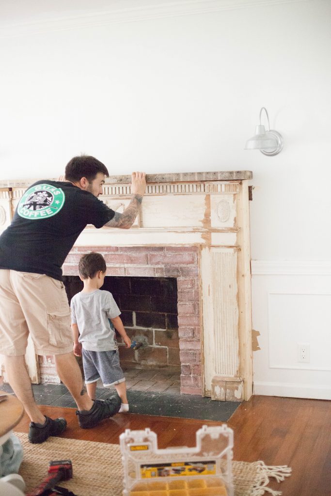 Our process for how to mount an antique mantle to our fireplace to add an antique flare to our living room.