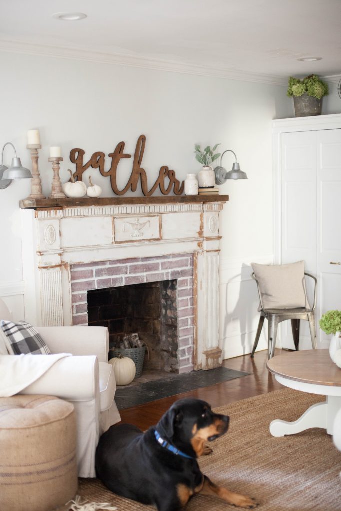 Our process for how to mount an antique mantle to our fireplace to add an antique flare to our living room.
