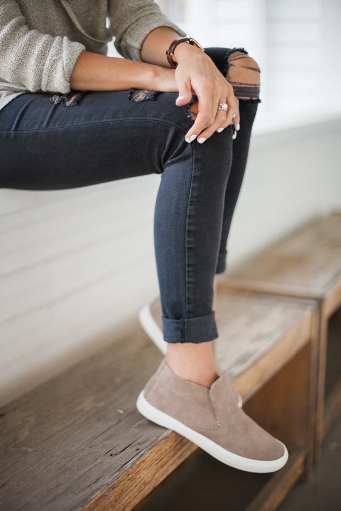 A casual fall outfit perfect for moms styling chic sneakers from DSW