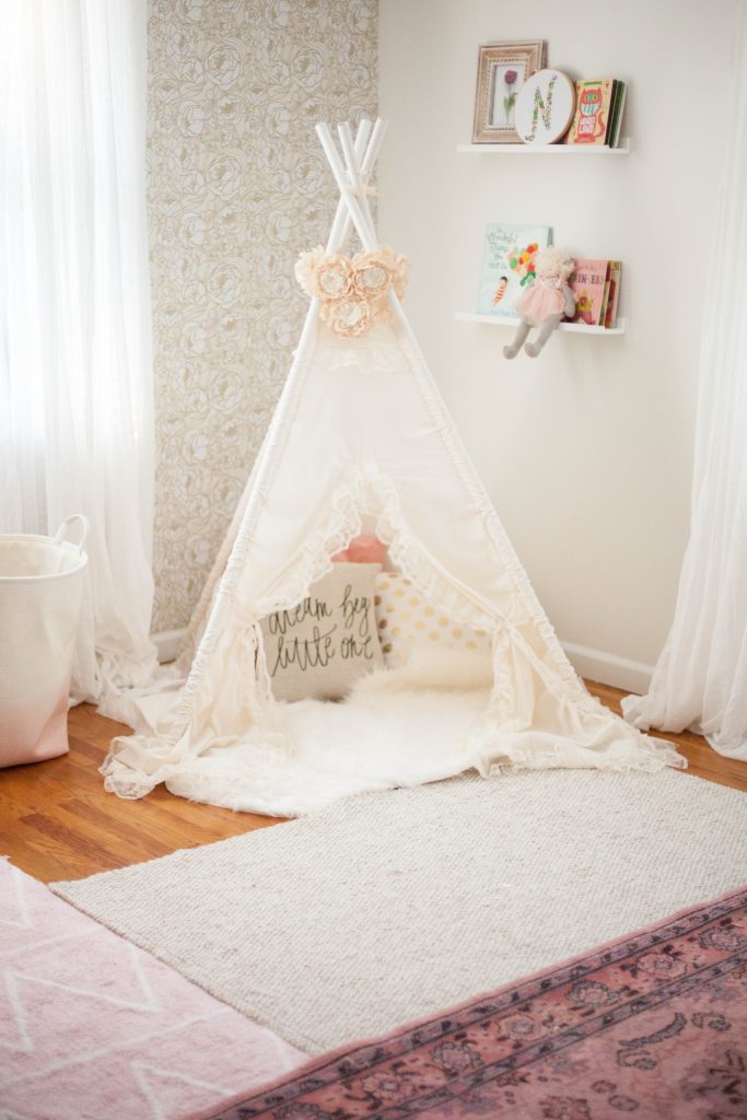 Layering rugs in a whimsical, bohemian nursery