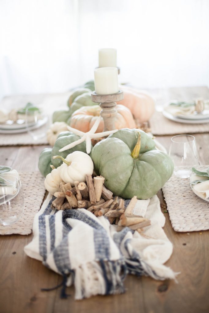 A simple coastal fall tablescape using natural elements and heirloom pumpkins for easy table decor for your fall entertaining!