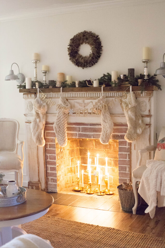 A simple and rustic farmhouse Christmas living room featuring a mixture of textures and vintage finds!