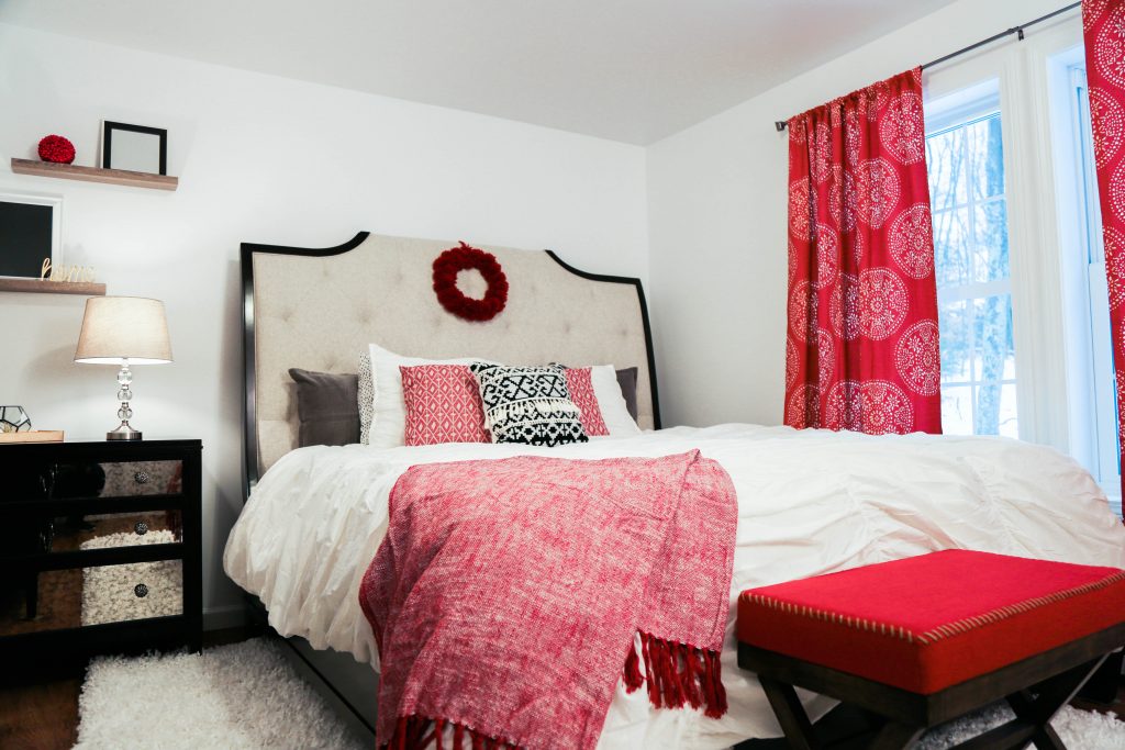 Bloggers Heart Habitat partner with Habitat for Humanity of Eastern Connecticut to design a glamorous master bedroom featuring red, white, and black decor.