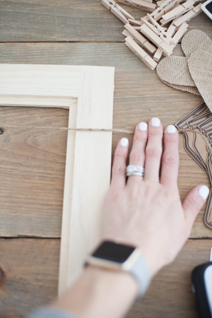 This simple DIY photo frame is easy enough for anyone to make, and makes for an easy interchangeable display frame year round.