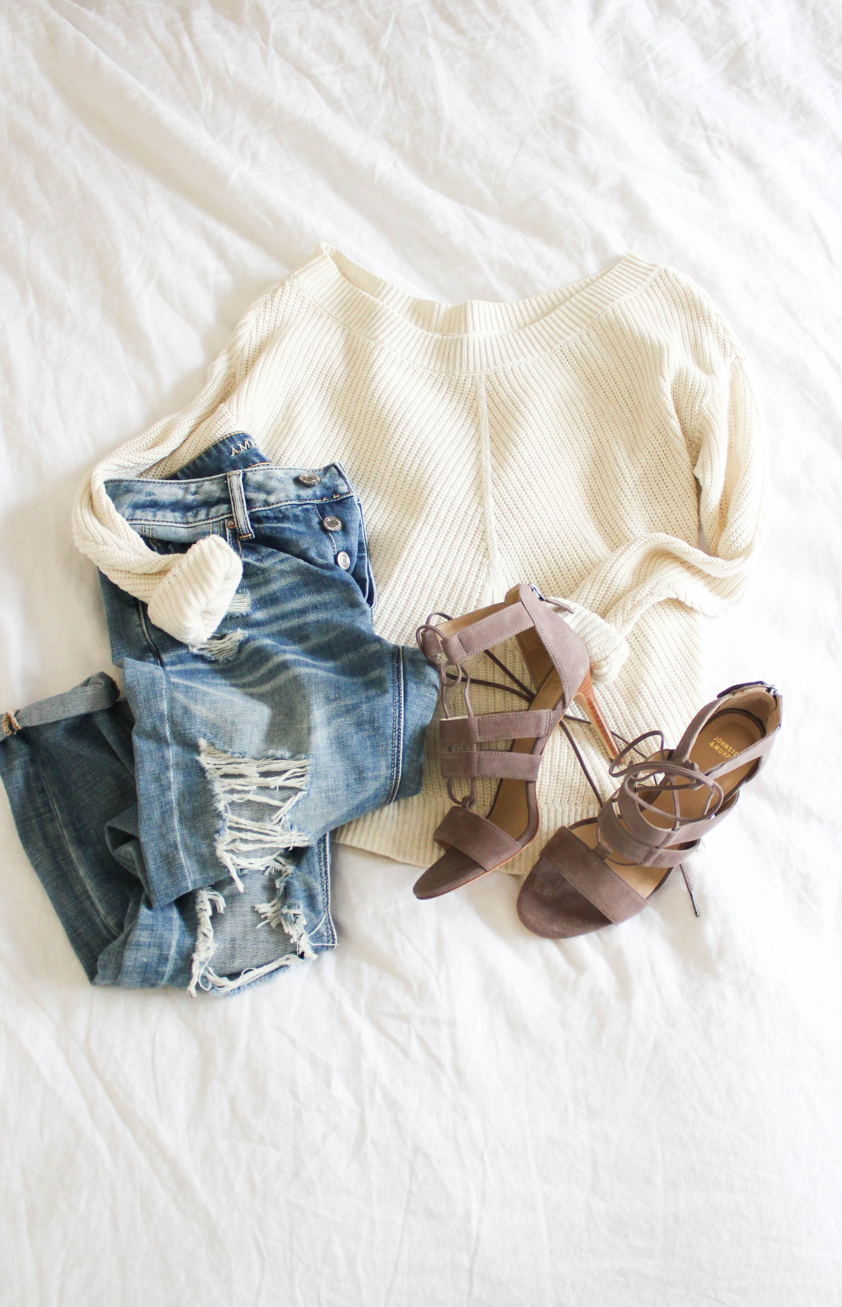 A casual way to style spring lace-up heels with distress boyfriend jeans and an off shoulder sweater.