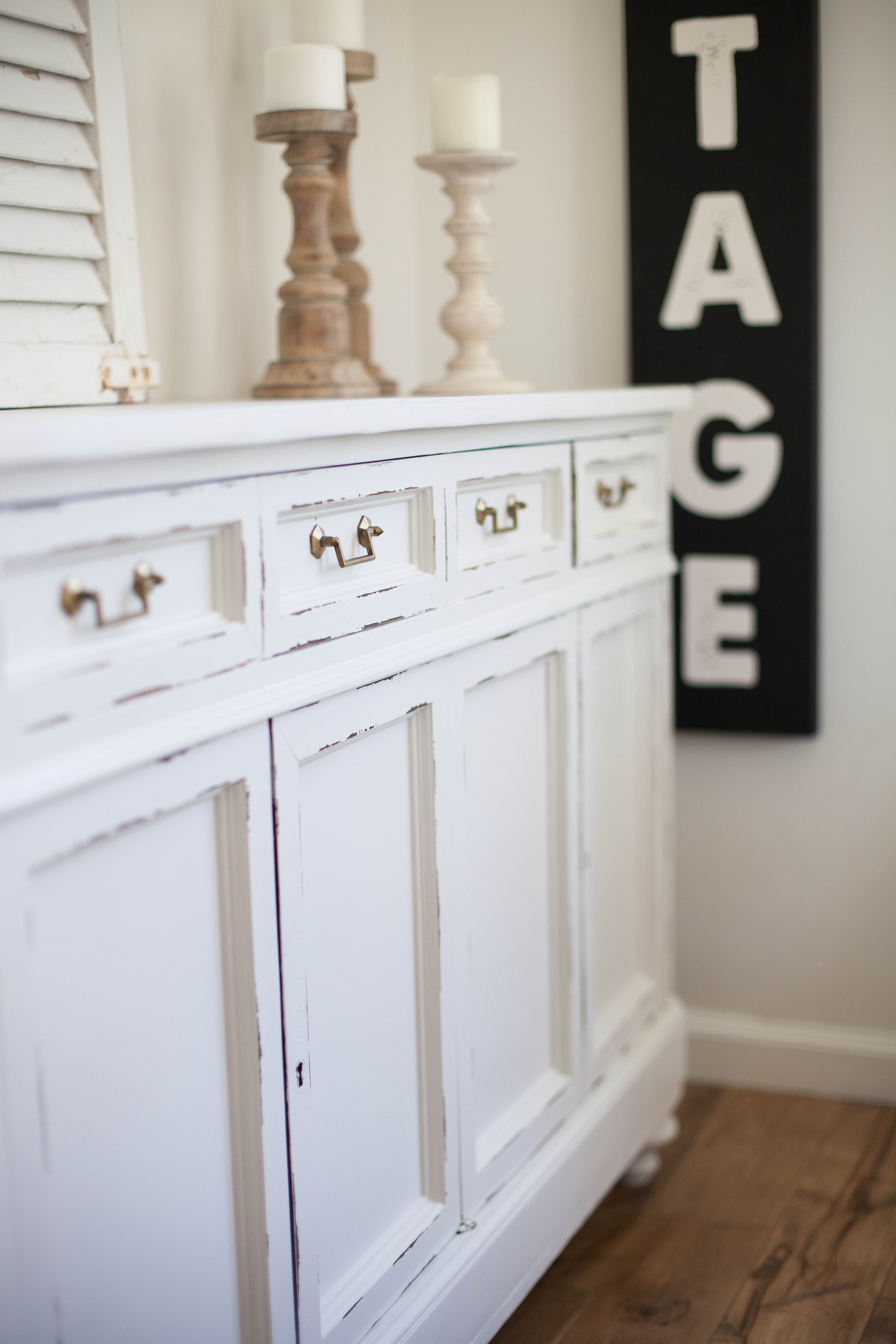 This spring cottage dining room features an antique sideboard that's been updated with Annie Sloan paint