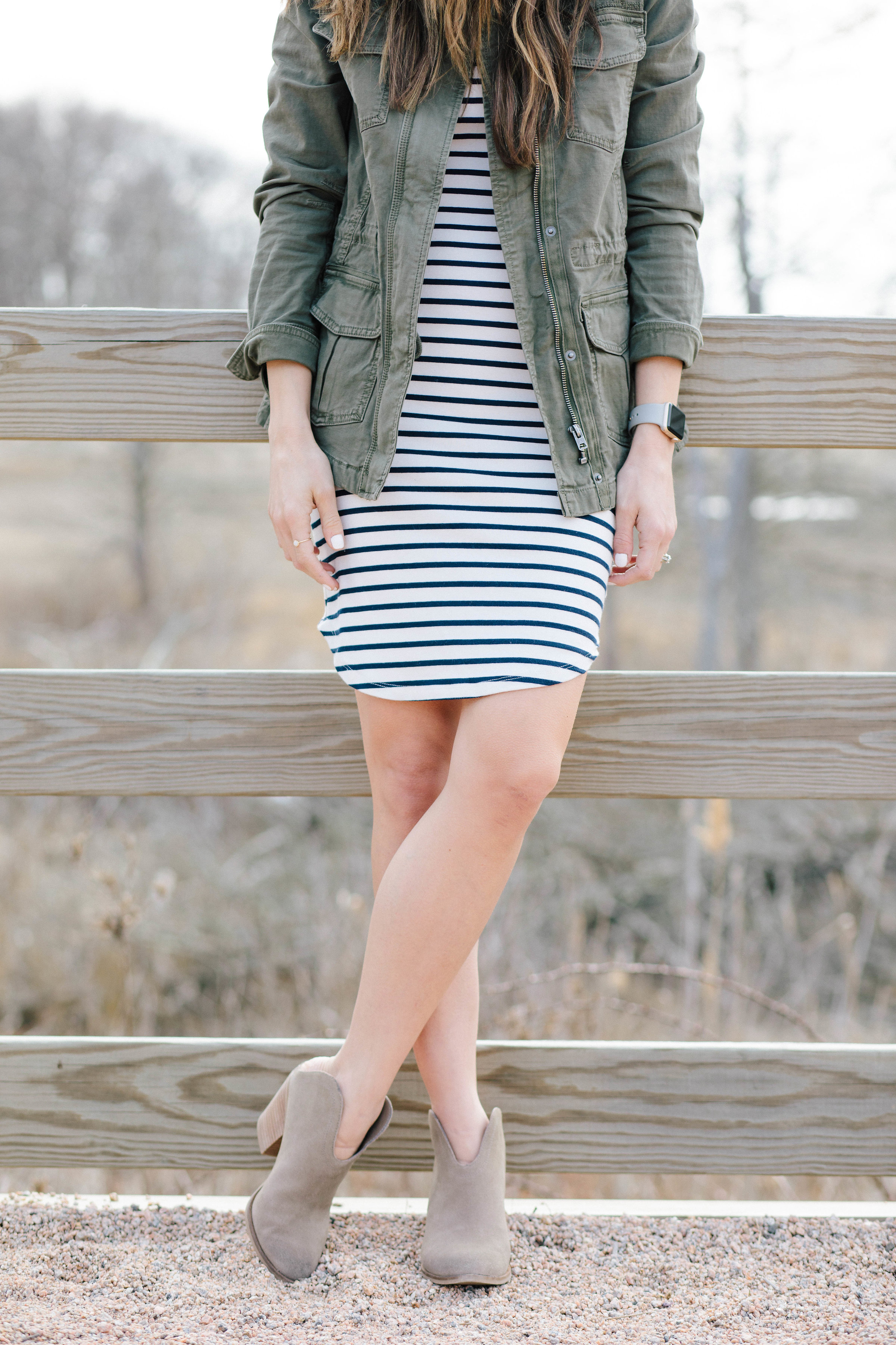 Need inspiration for how to style a striped dress? Adding a cargo jacket and booties is one of three ways in this post!