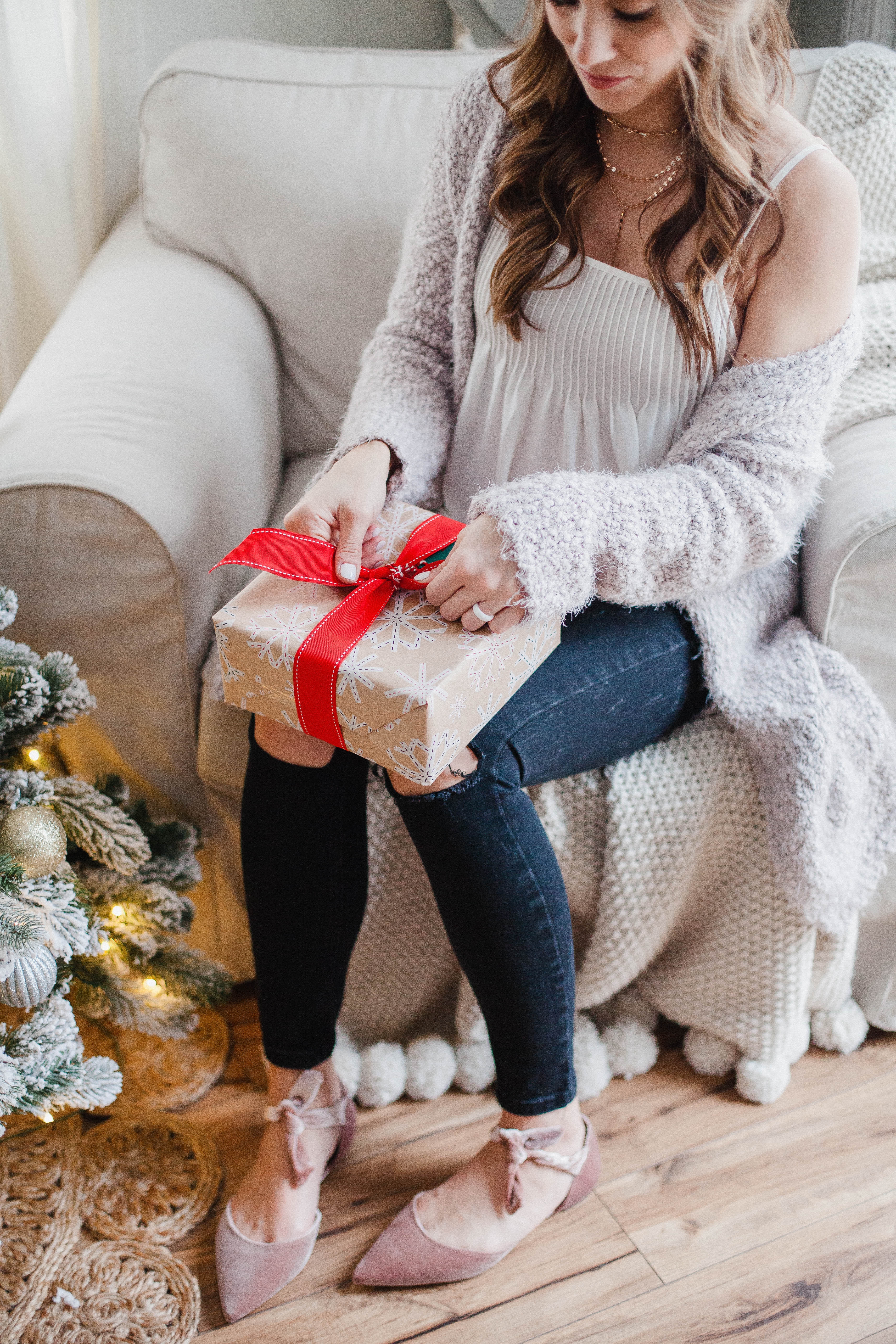 Life and style blogger Lauren McBride shares a Casual Holiday Maternity Outfit that's comfortable yet festive for holiday season. 