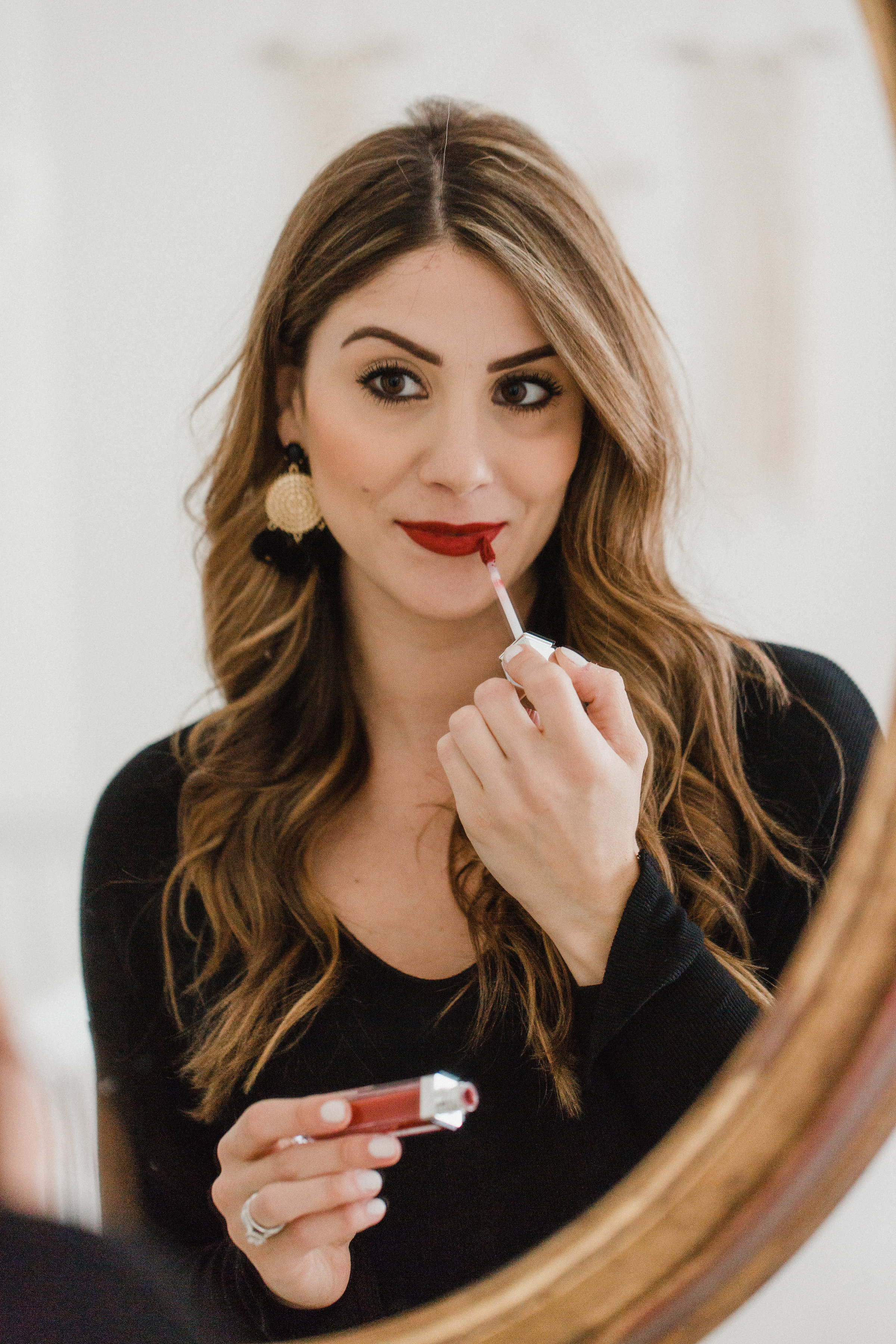 Life and style blogger Lauren McBride shares three simple holiday makeup tips that take minimal time and effort and will enhance your look for the holidays!