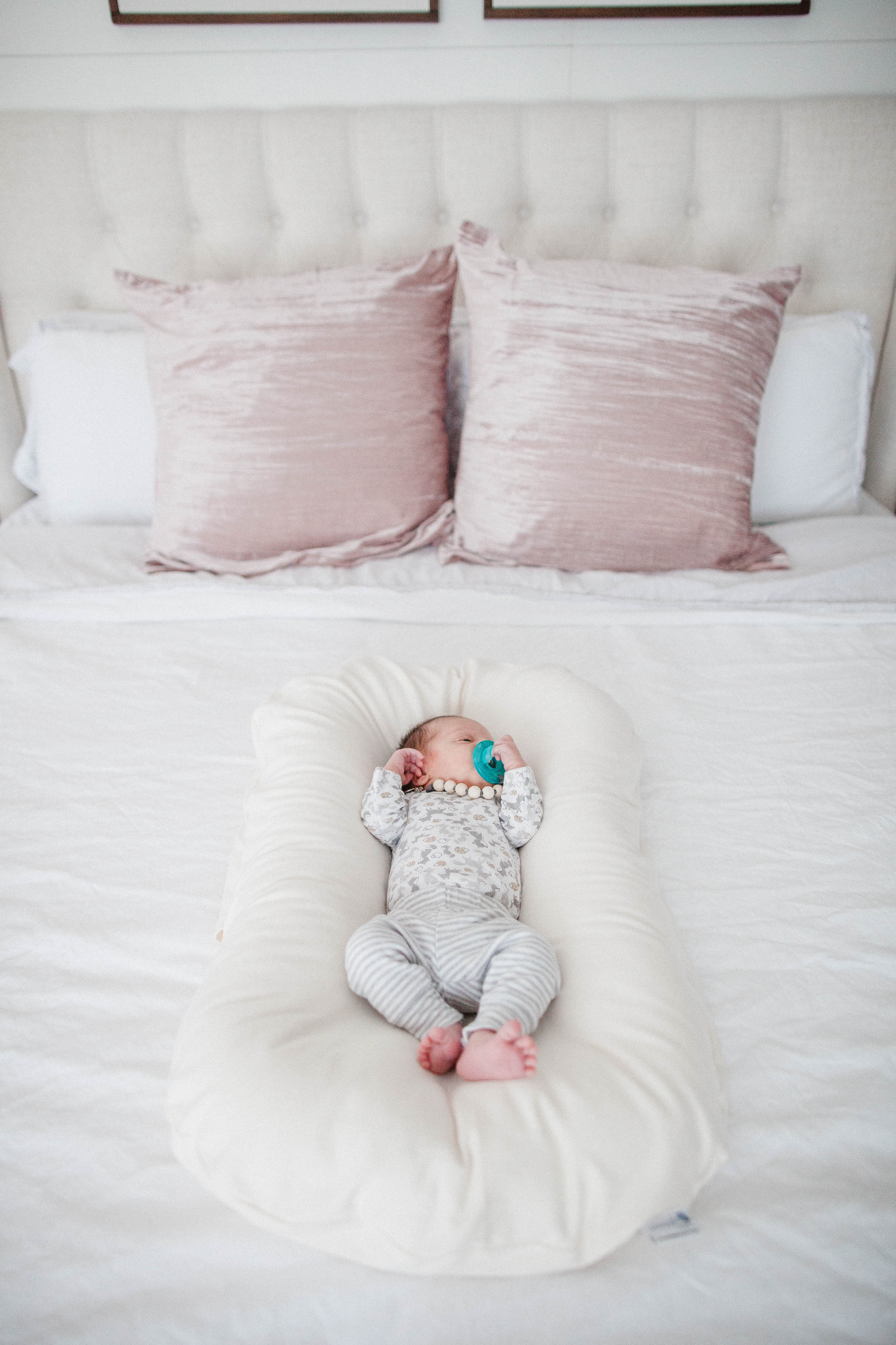 Life and style blogger Lauren McBride shares her Snuggle Me Review and coupon code and why it's the safest baby lounger on the market.