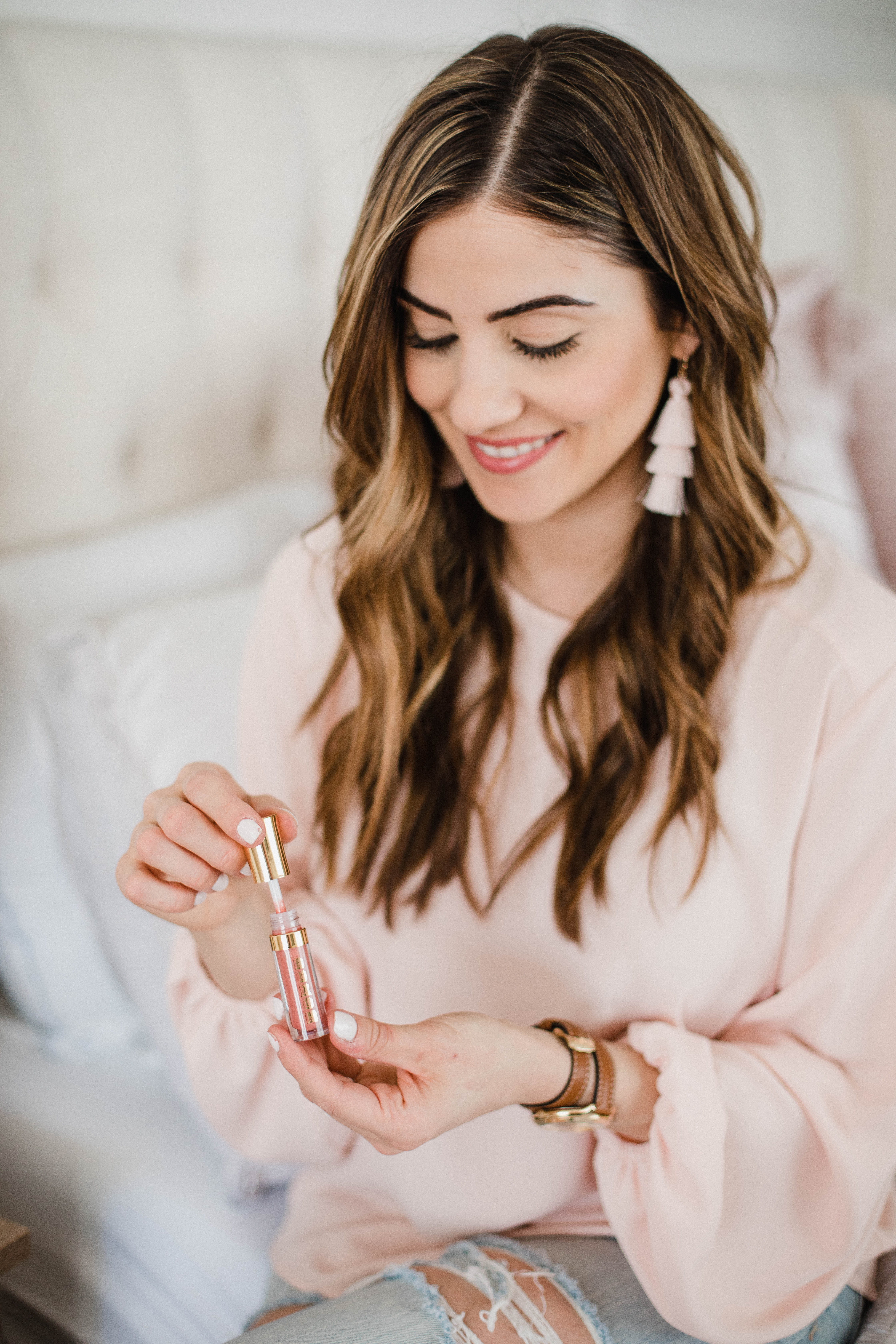 Life and style blogger Lauren McBride shares 8 must have products for spring, including a variety of skincare and beauty products. 