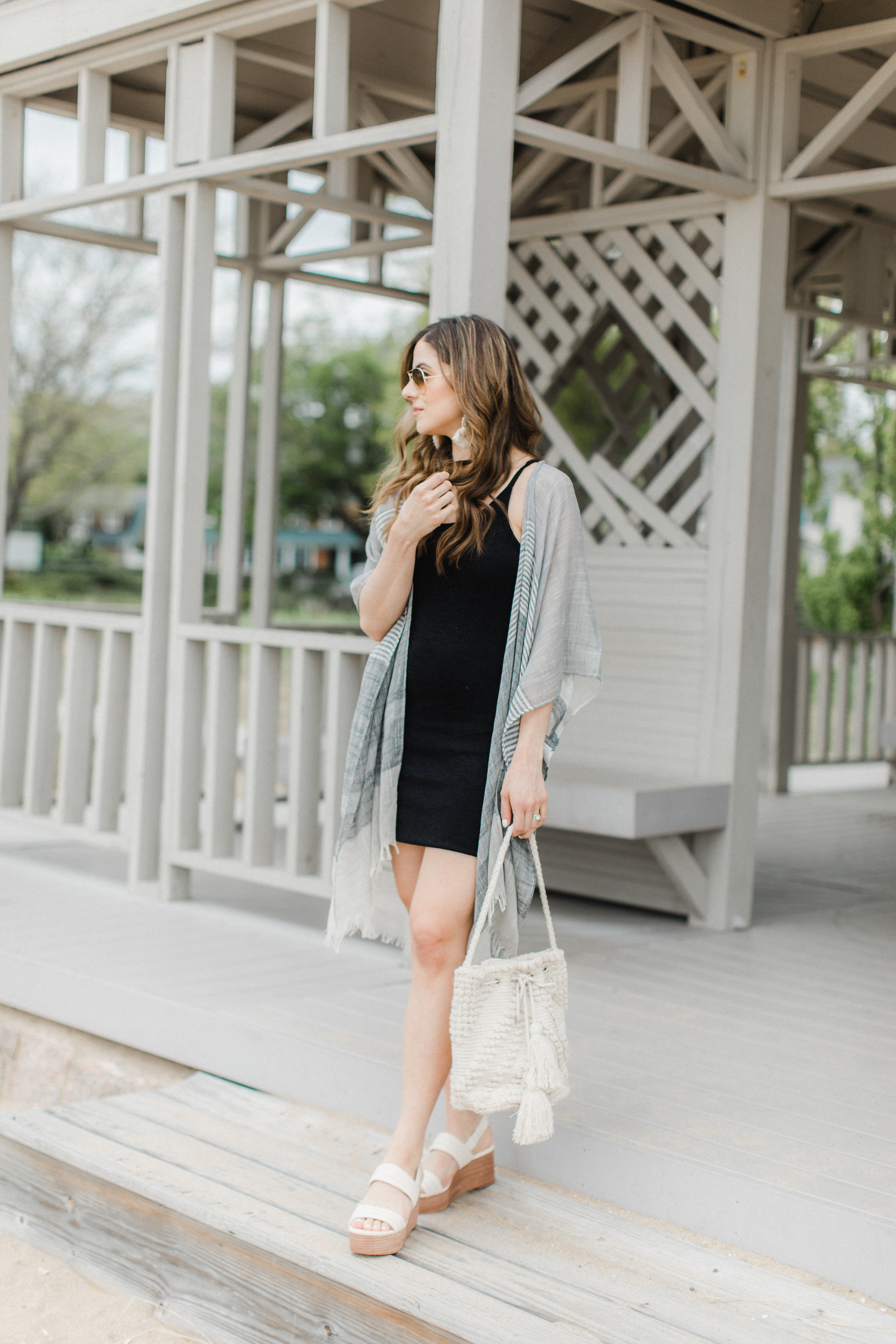 Life and style blogger Lauren McBride shares How to Style a Kimono for summer, featuring two looks taking a kimono from daytime to nighttime.