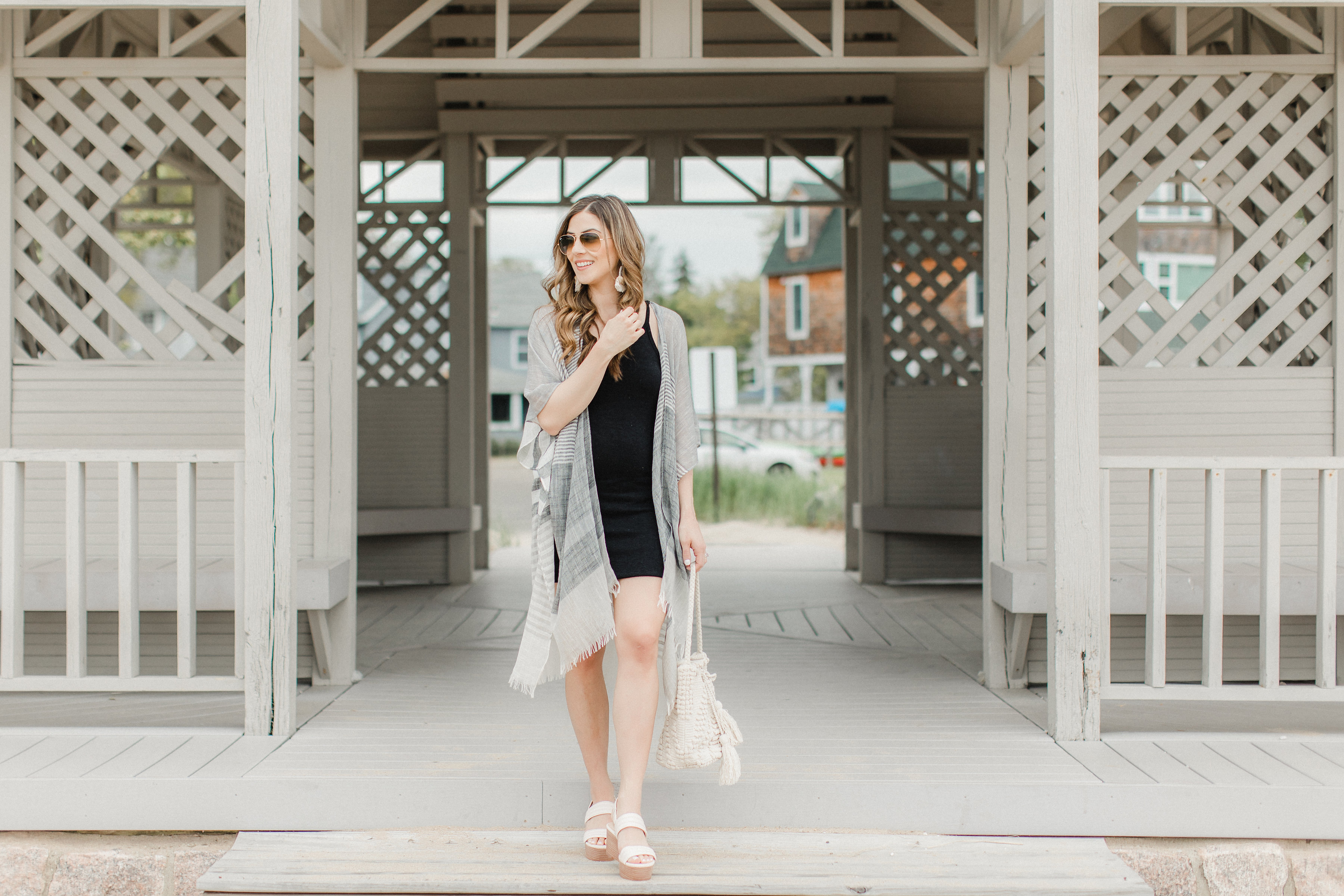 Life and style blogger Lauren McBride shares How to Style a Kimono for summer, featuring two looks taking a kimono from daytime to nighttime.
