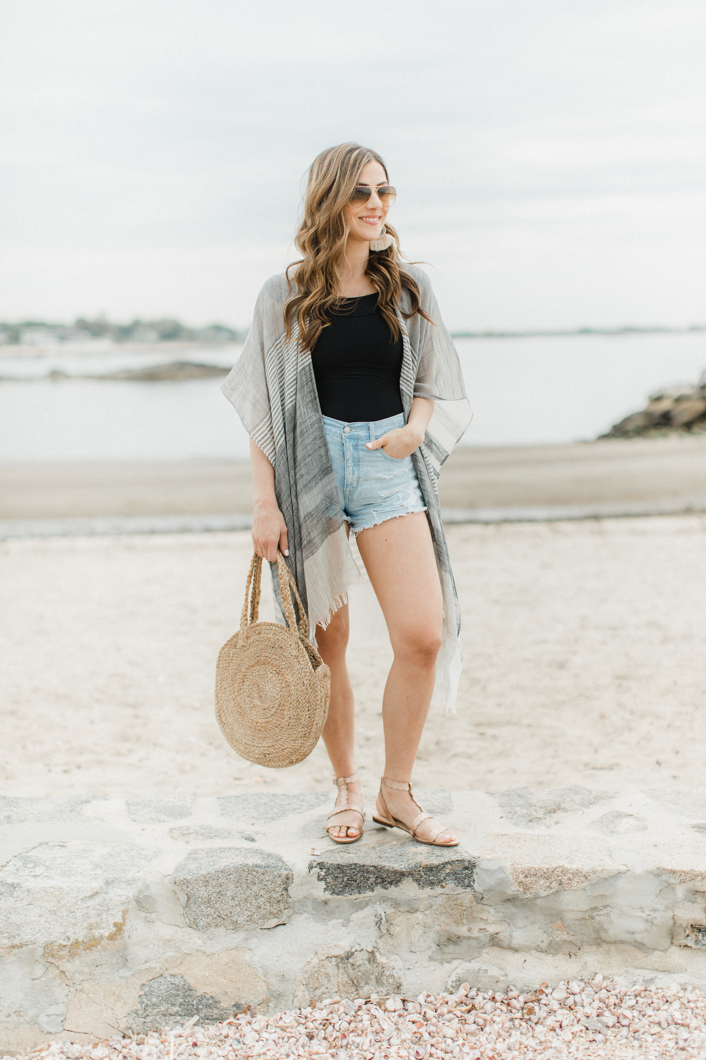 Life and style blogger Lauren McBride shares How to Style a Kimono for summer, featuring two looks taking a kimono from daytime to nighttime.