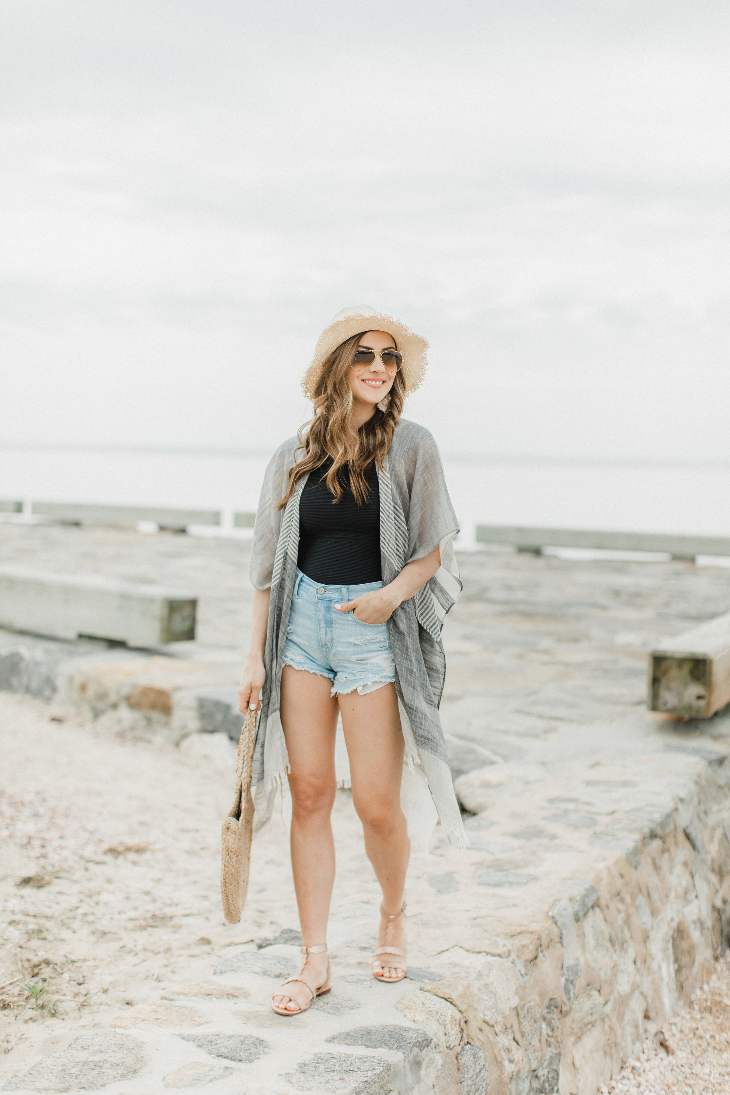 Life and style blogger Lauren McBride shares How to Style a Kimono for summer, featuring two looks taking a kimono from daytime to nighttime.