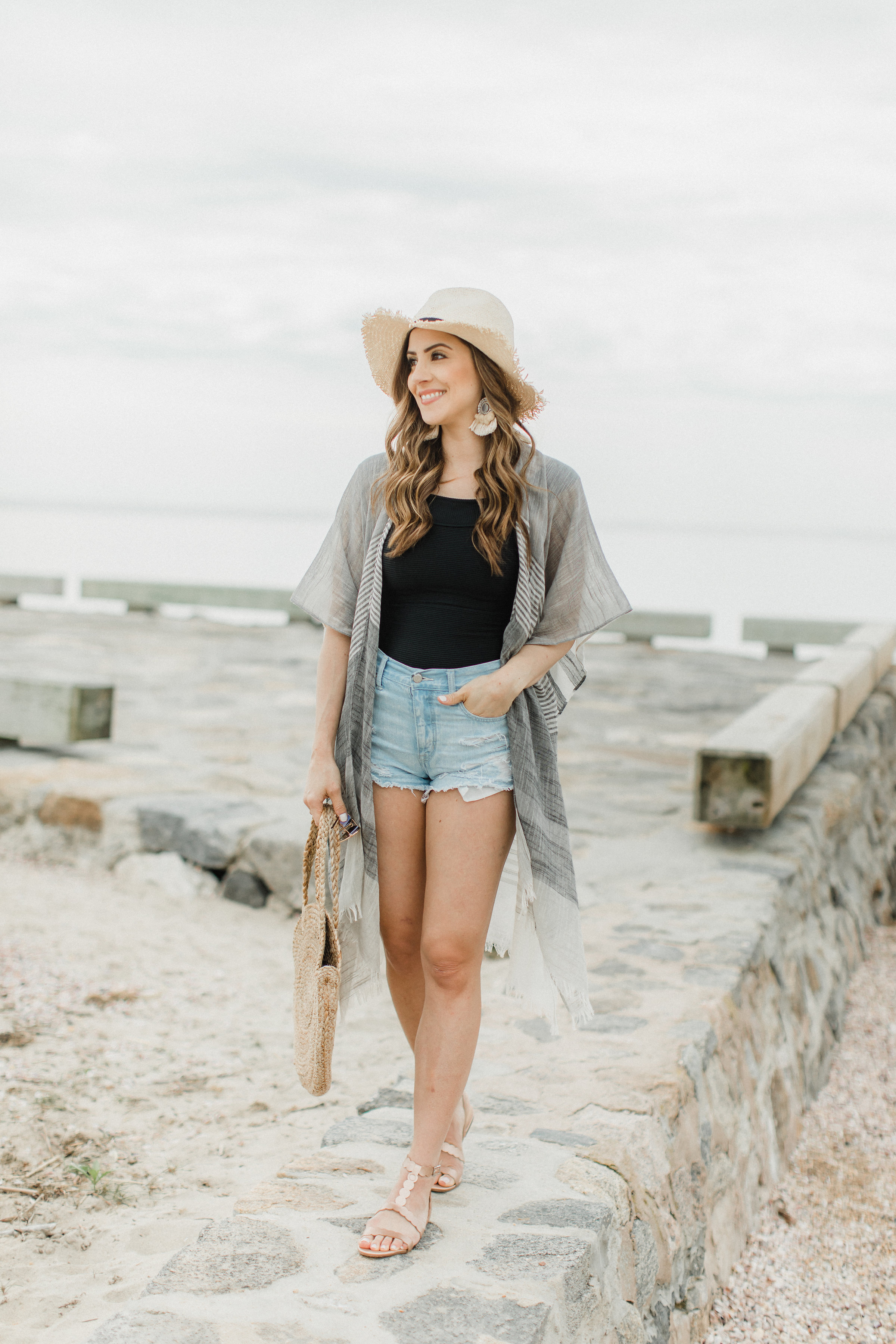 Life and style blogger Lauren McBride shares How to Style a Kimono for summer, featuring two looks taking a kimono from daytime to nighttime.