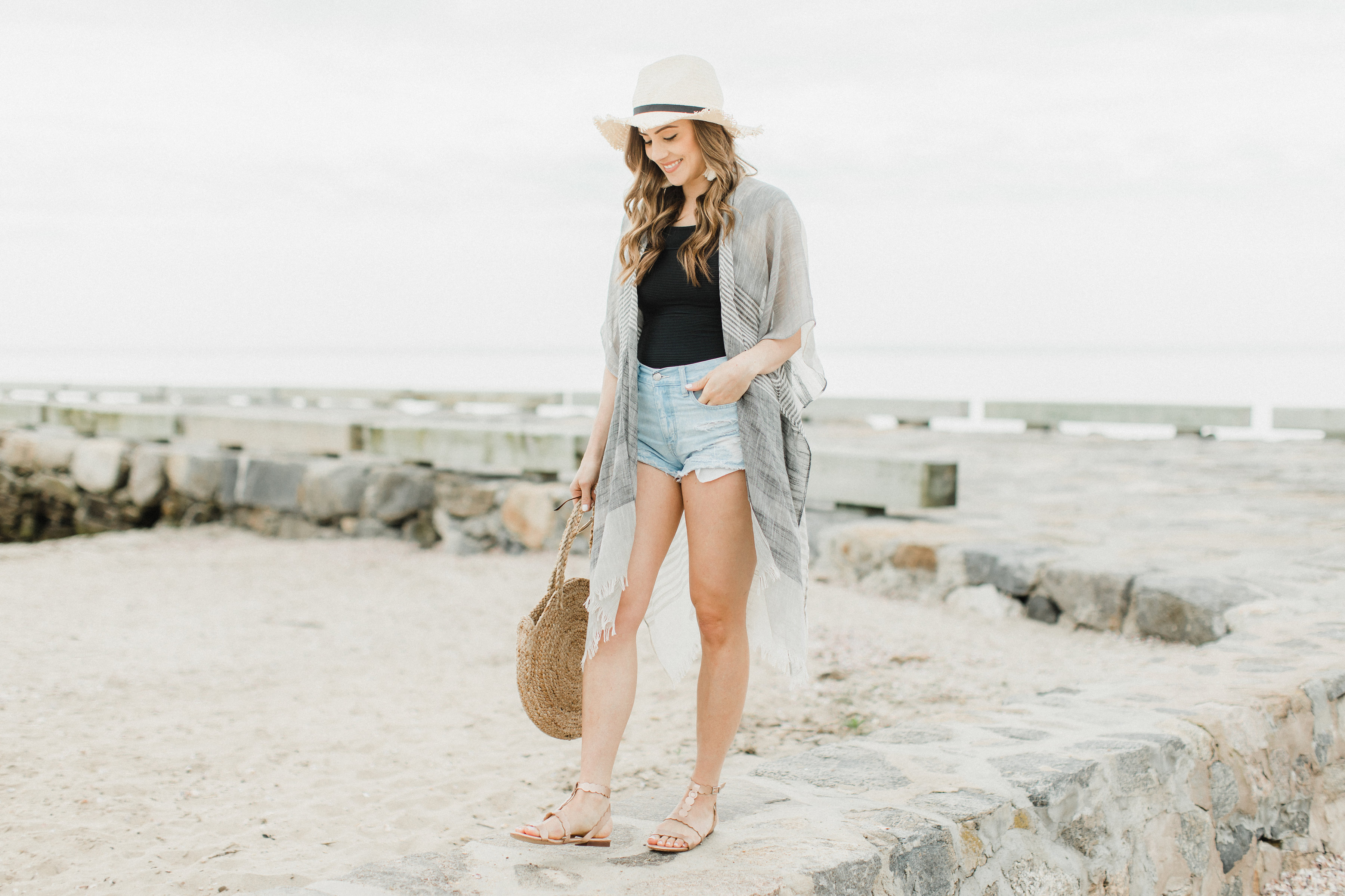 Life and style blogger Lauren McBride shares How to Style a Kimono for summer, featuring two looks taking a kimono from daytime to nighttime.