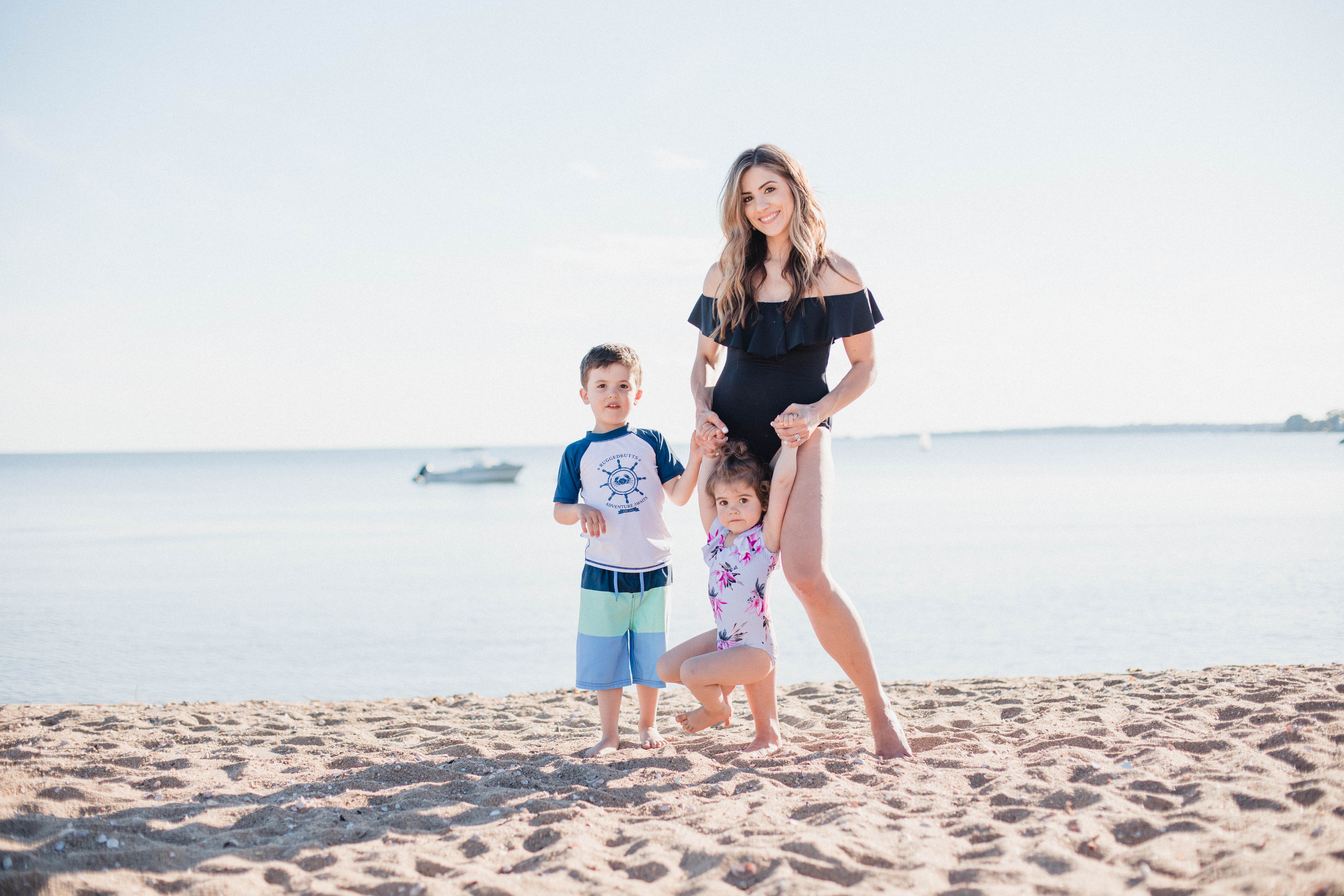 Life and style blogger Lauren McBride shares her Beach Essentials for Kids that will get your family through beach season this summer, featuring swimwear, toys, and more.