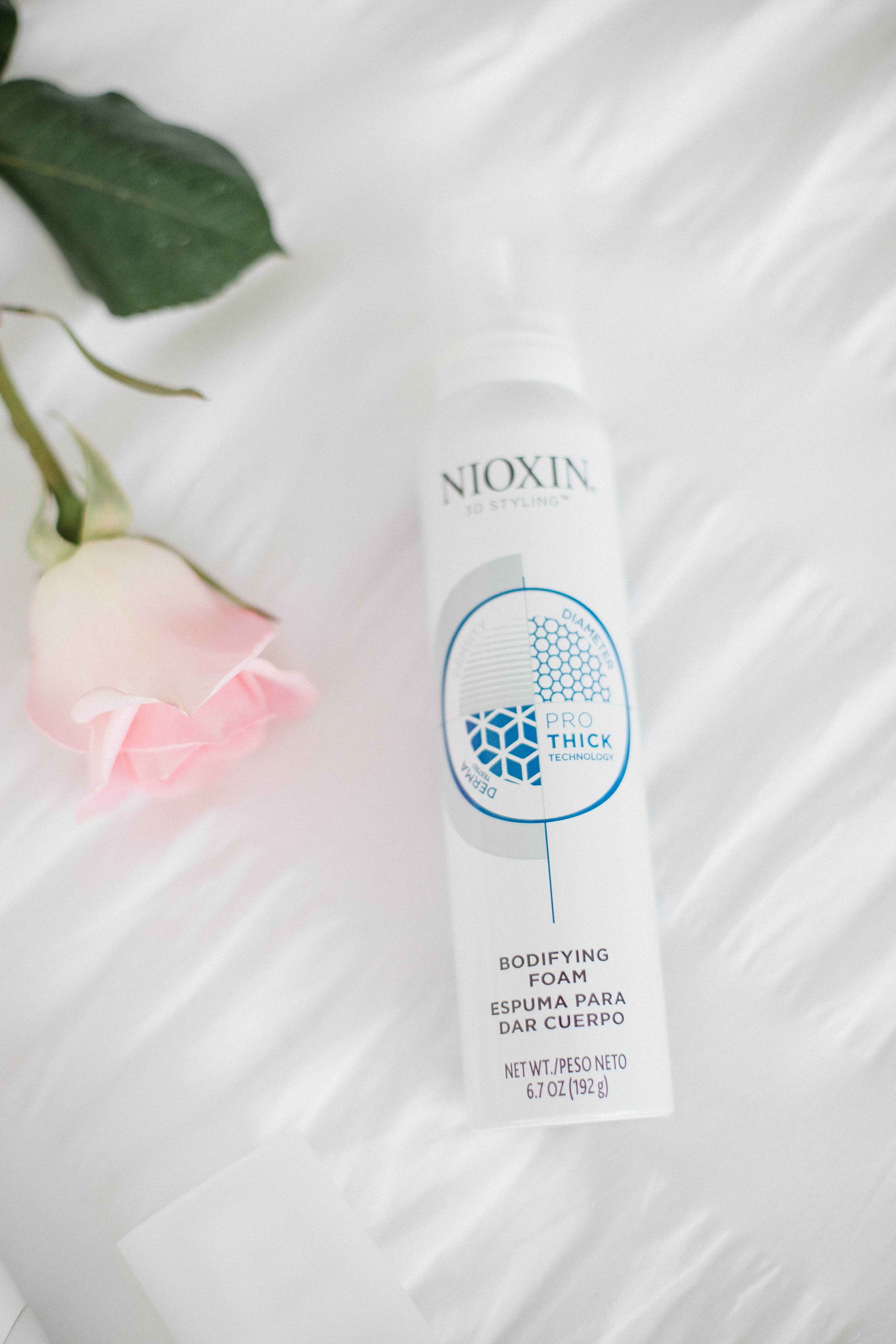 Life and style blogger Lauren McBride shares the Best Styling Products for Postpartum Hair loss featuring products from Nioxin.