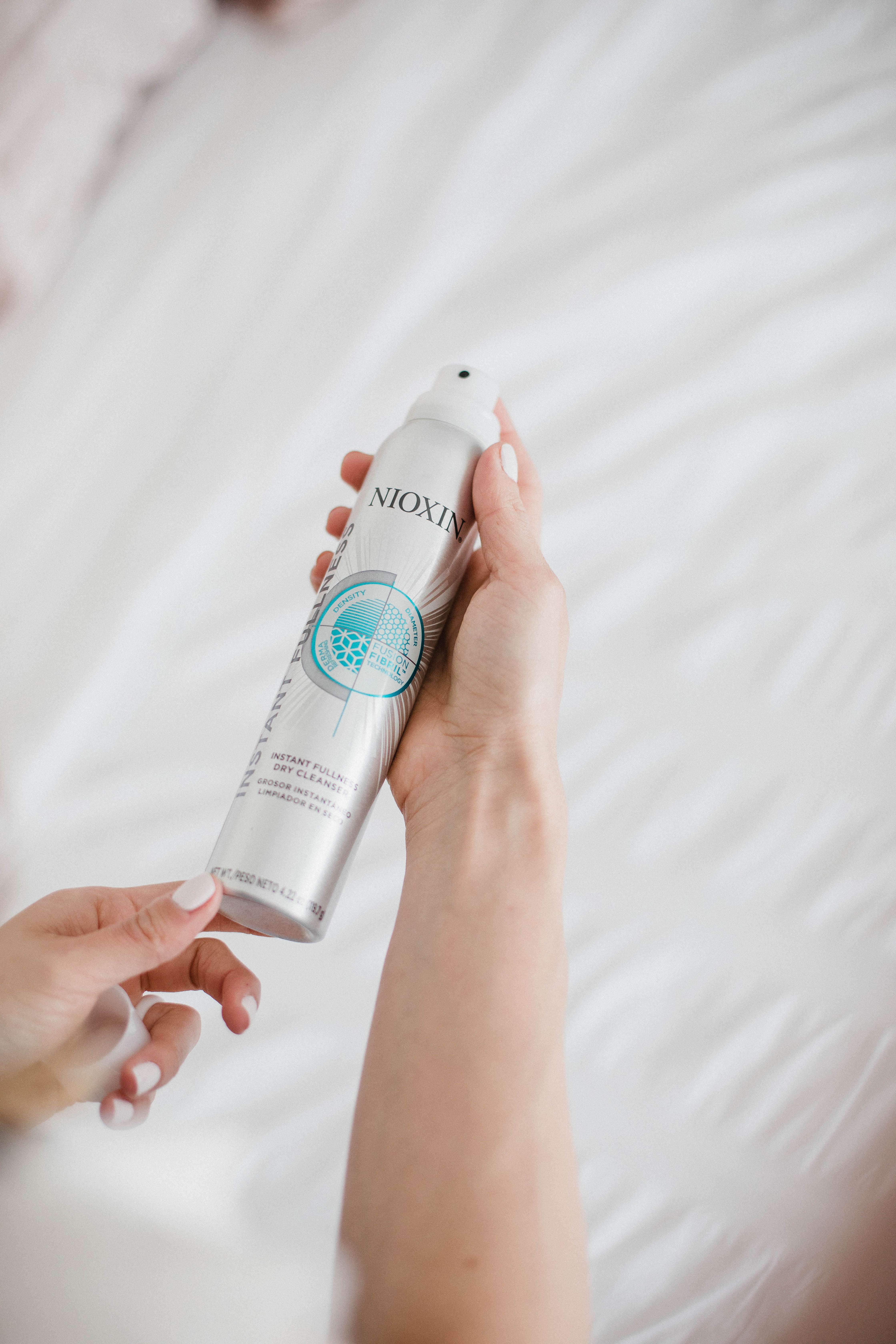 Life and style blogger Lauren McBride shares the Best Styling Products for Postpartum Hair loss featuring products from Nioxin.