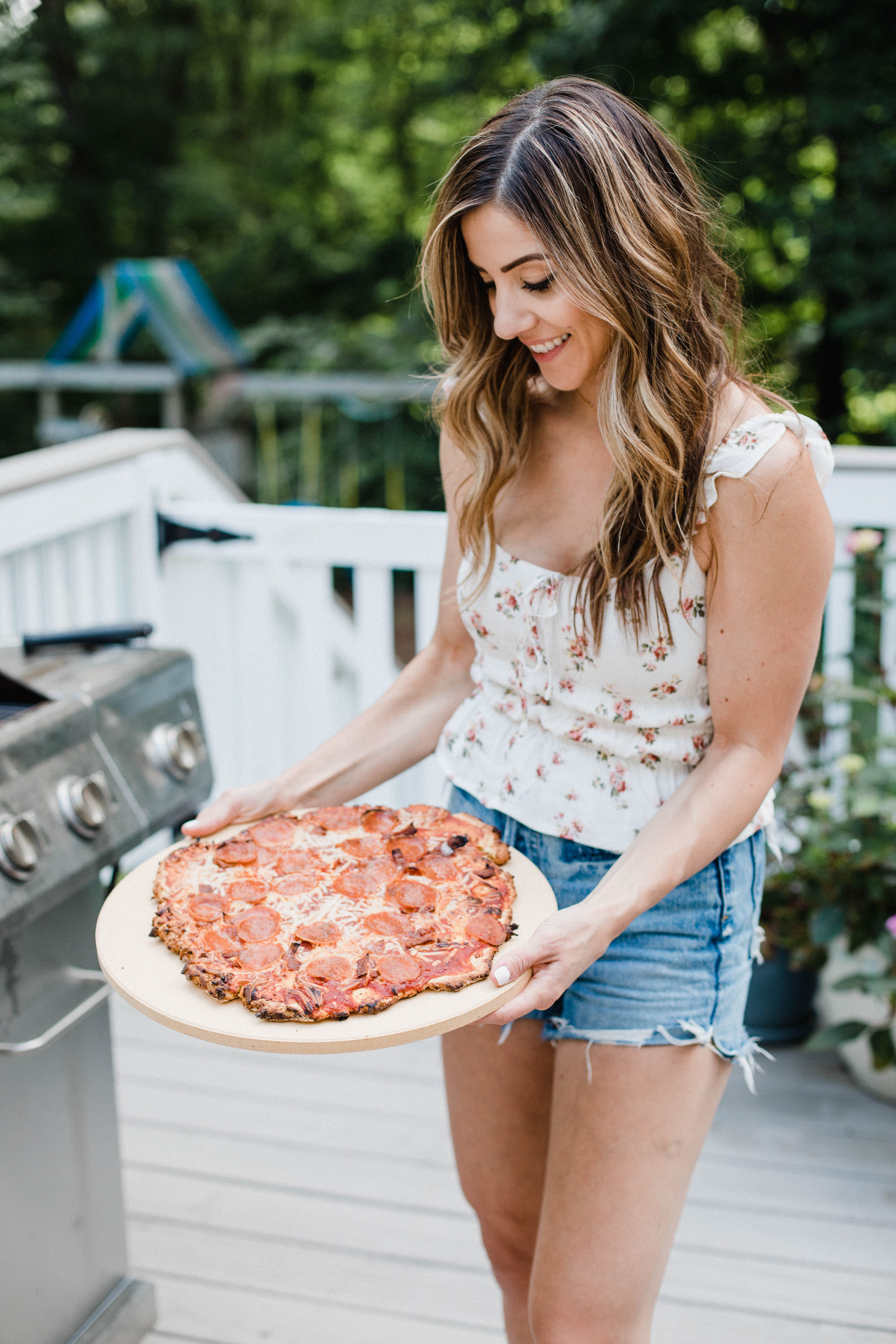 Connecticut life and style blogger Lauren McBride shares Easy Gluten Free Grilled Pizza and one item that makes grilling pizza perfect every time.