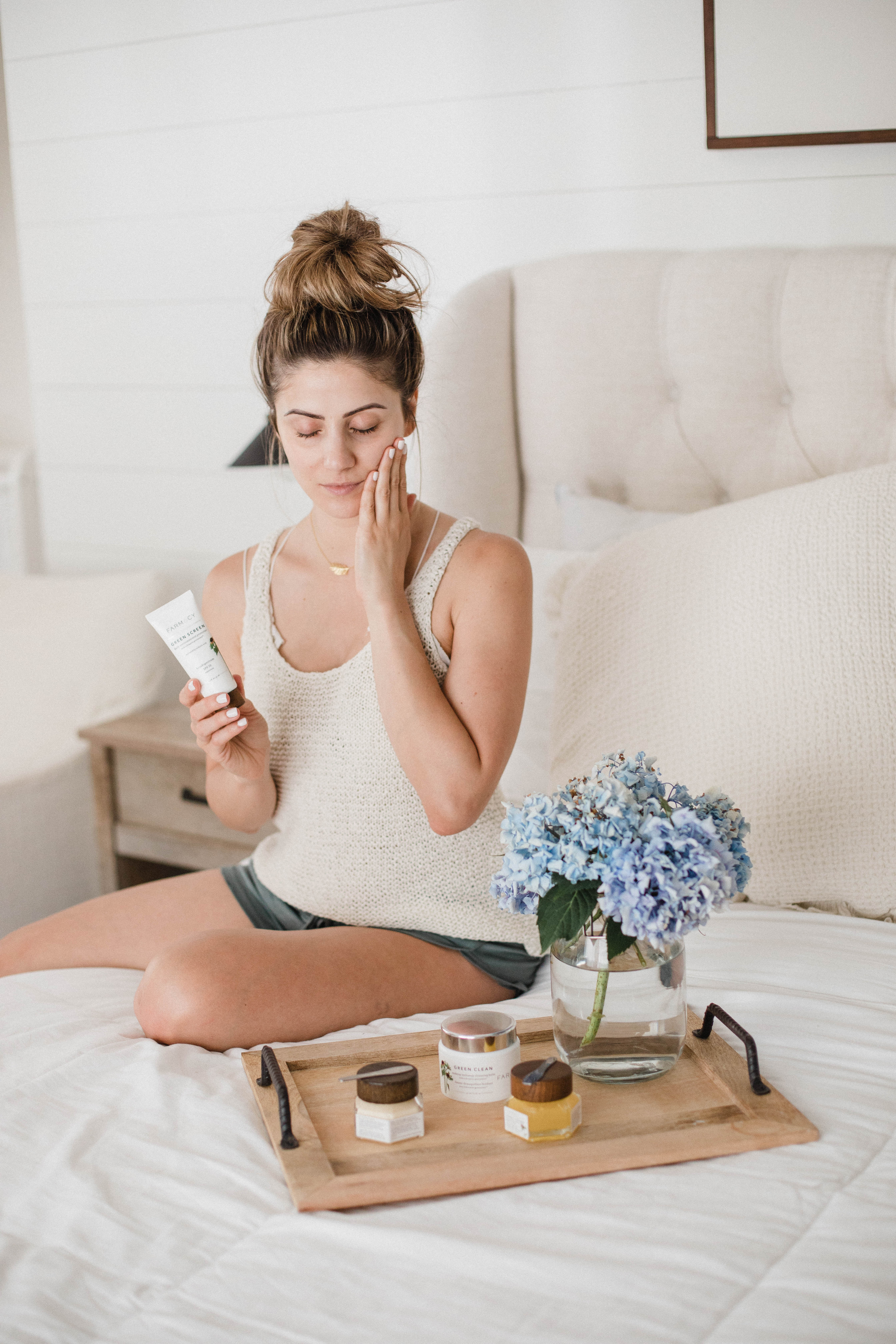 Connecticut Life and style blogger Lauren McBride shares 4 of Farmacy Beauty's best seller clean skincare products, including Green Clean, Honey Drop, Honey Potion, and Green Screen.