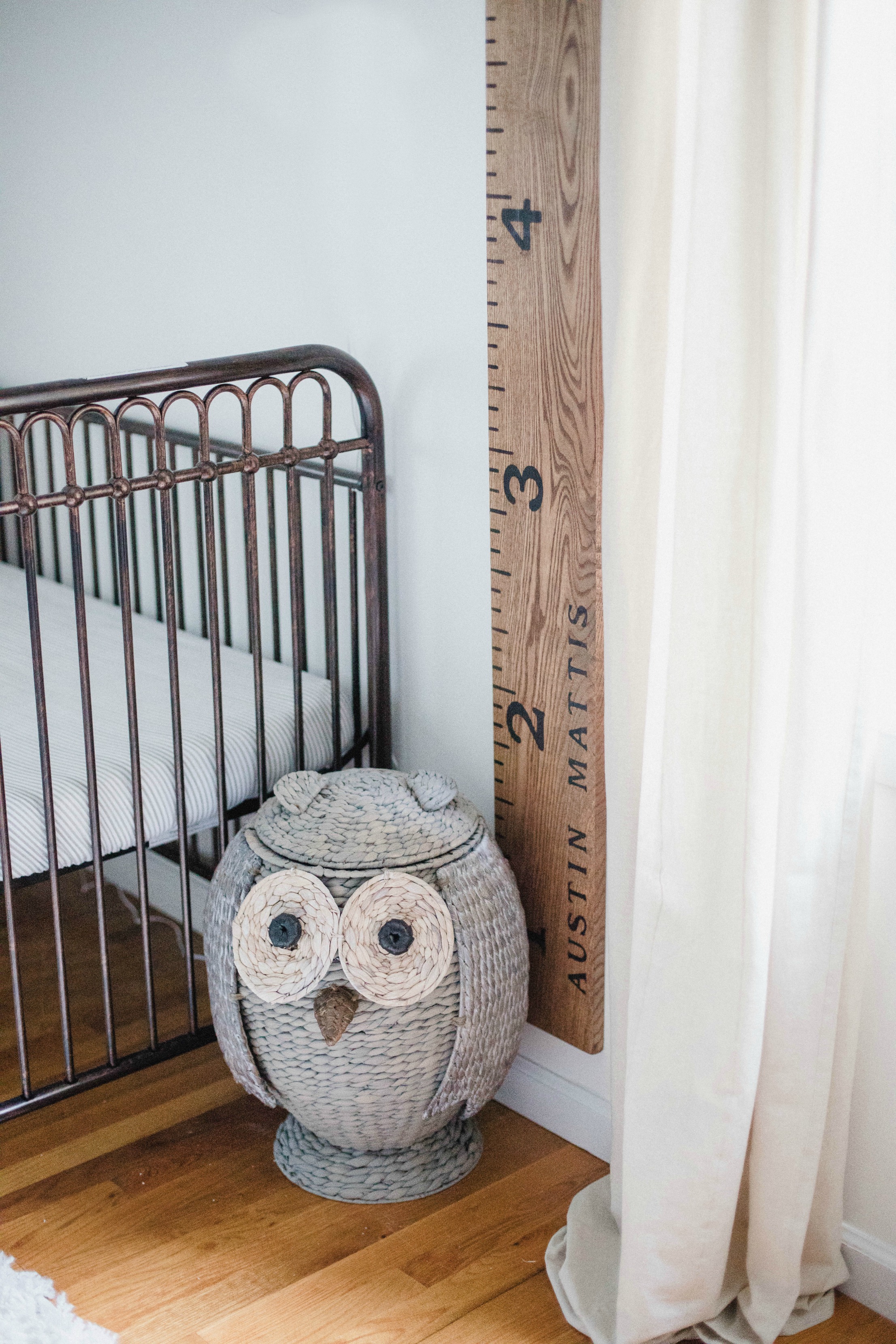 Connecticut life and style blogger Lauren McBride shares a shared boys bedroom update featuring a unique wallpaper wall using products from Home Depot.