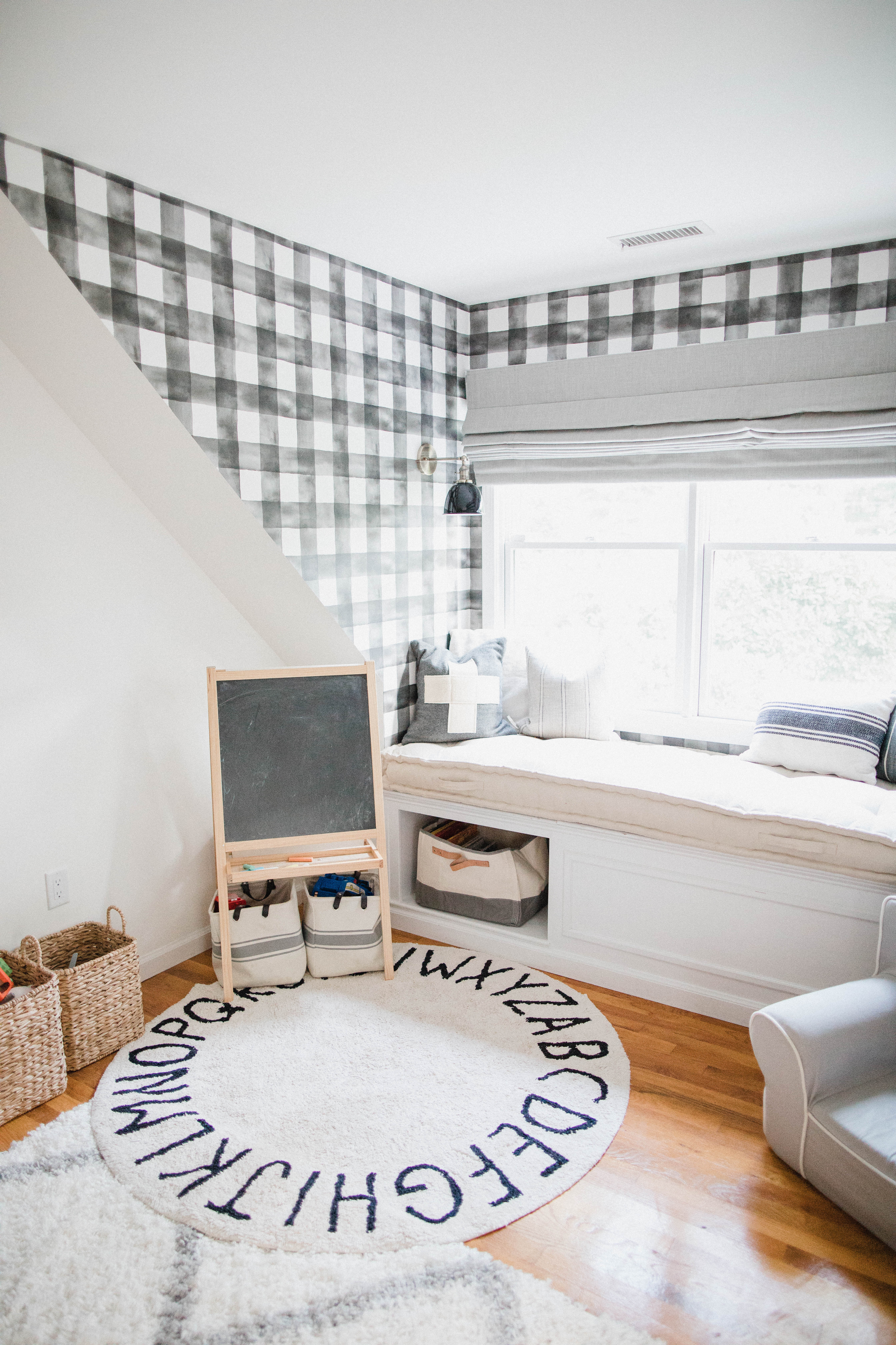 Connecticut life and style blogger Lauren McBride shares a shared boys bedroom update featuring a unique wallpaper wall using products from Home Depot.