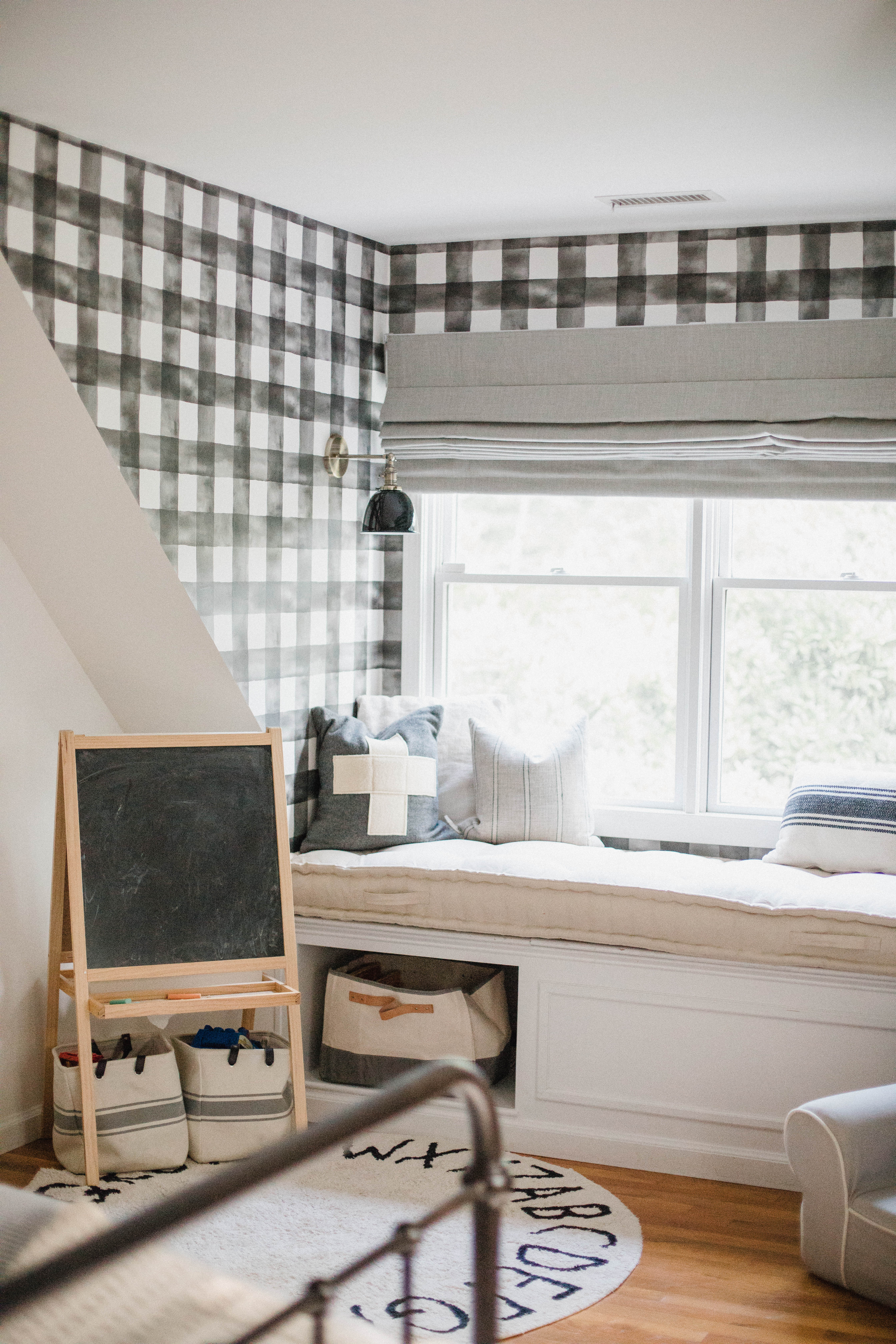 Connecticut life and style blogger Lauren McBride shares a shared boys bedroom update featuring a unique wallpaper wall using products from Home Depot.