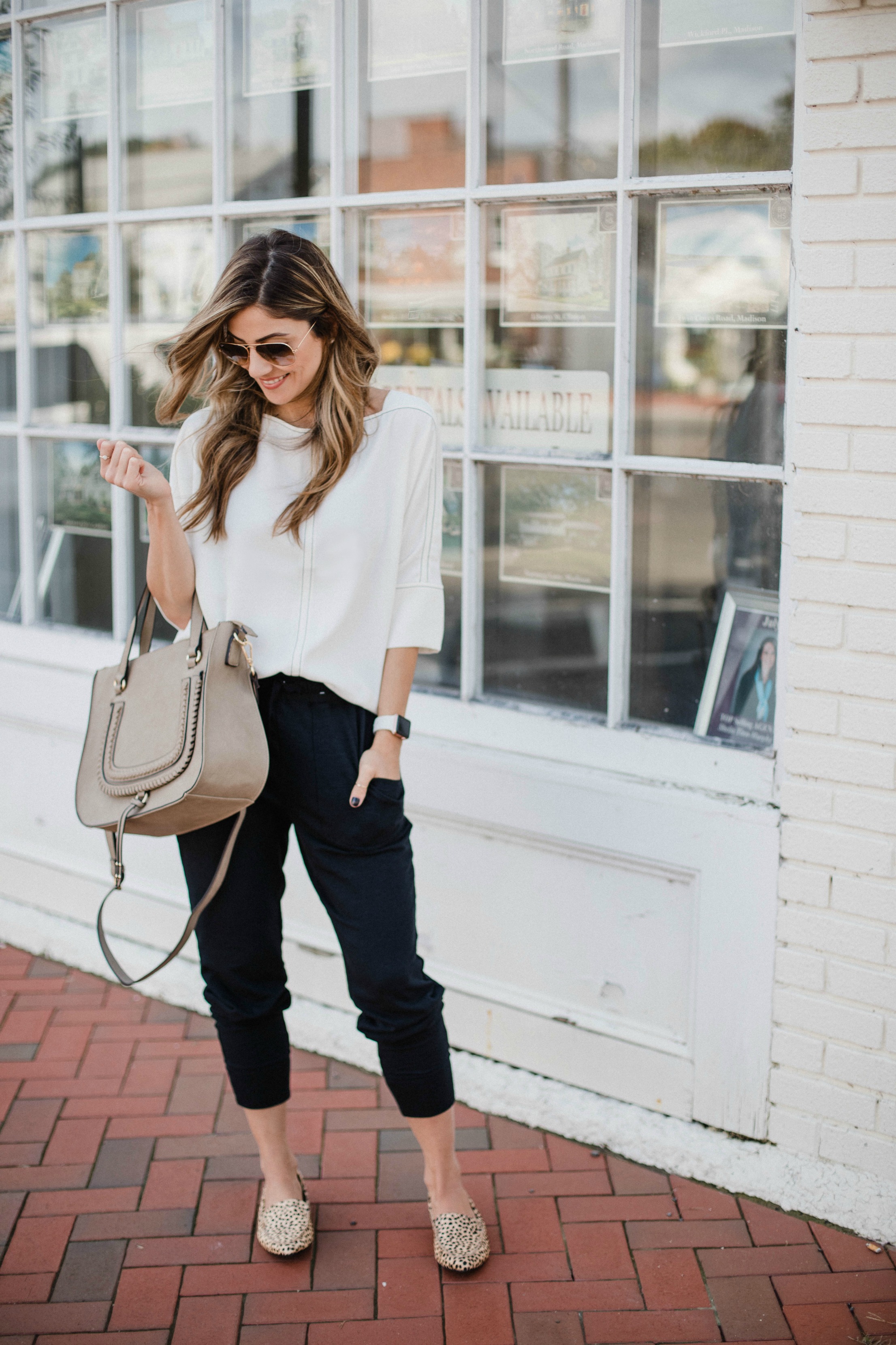 Connecticut based life and style blogger Lauren McBride shares How to Style Joggers two ways: one for work and one for casual, every day wear. 