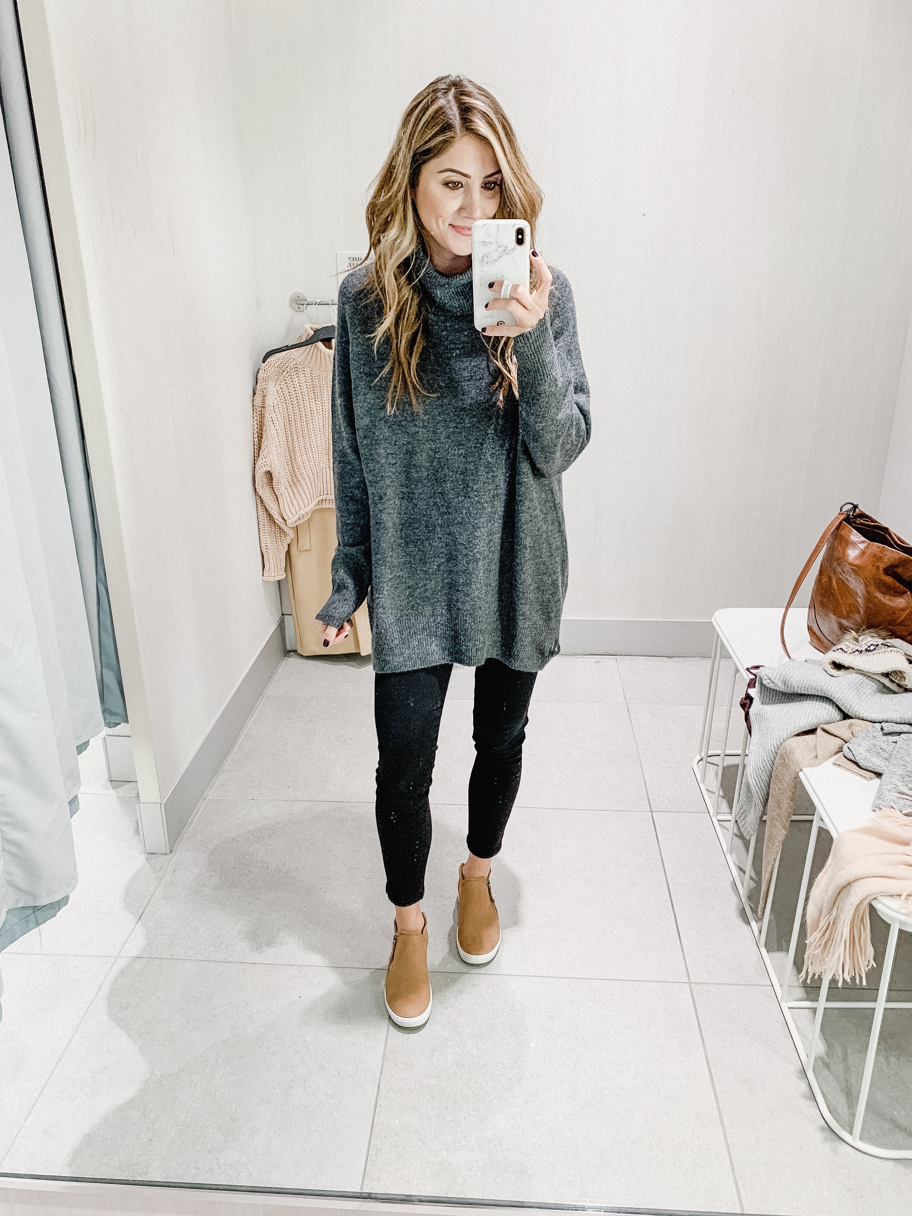 Connecticut life and style blogger Lauren McBride shares a Fall H&M try on session featuring cozy sweaters and scarves for under $35.