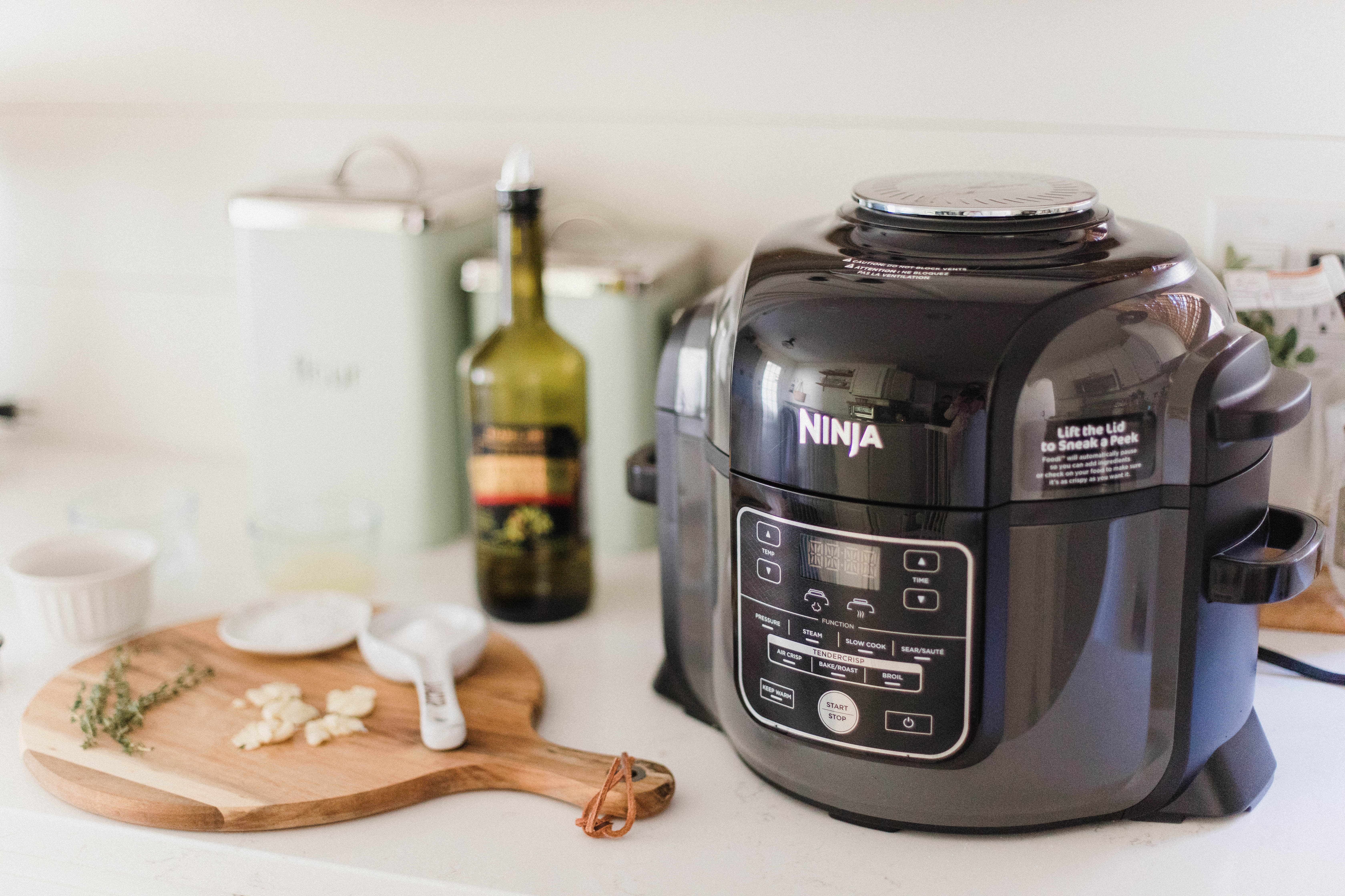 Connecticut life and style blogger Laure McBride shares a Ninja Foodi review, showcasing the pressure cooker and air fryer tecnhnology Ninja offers with their new and innovative product.