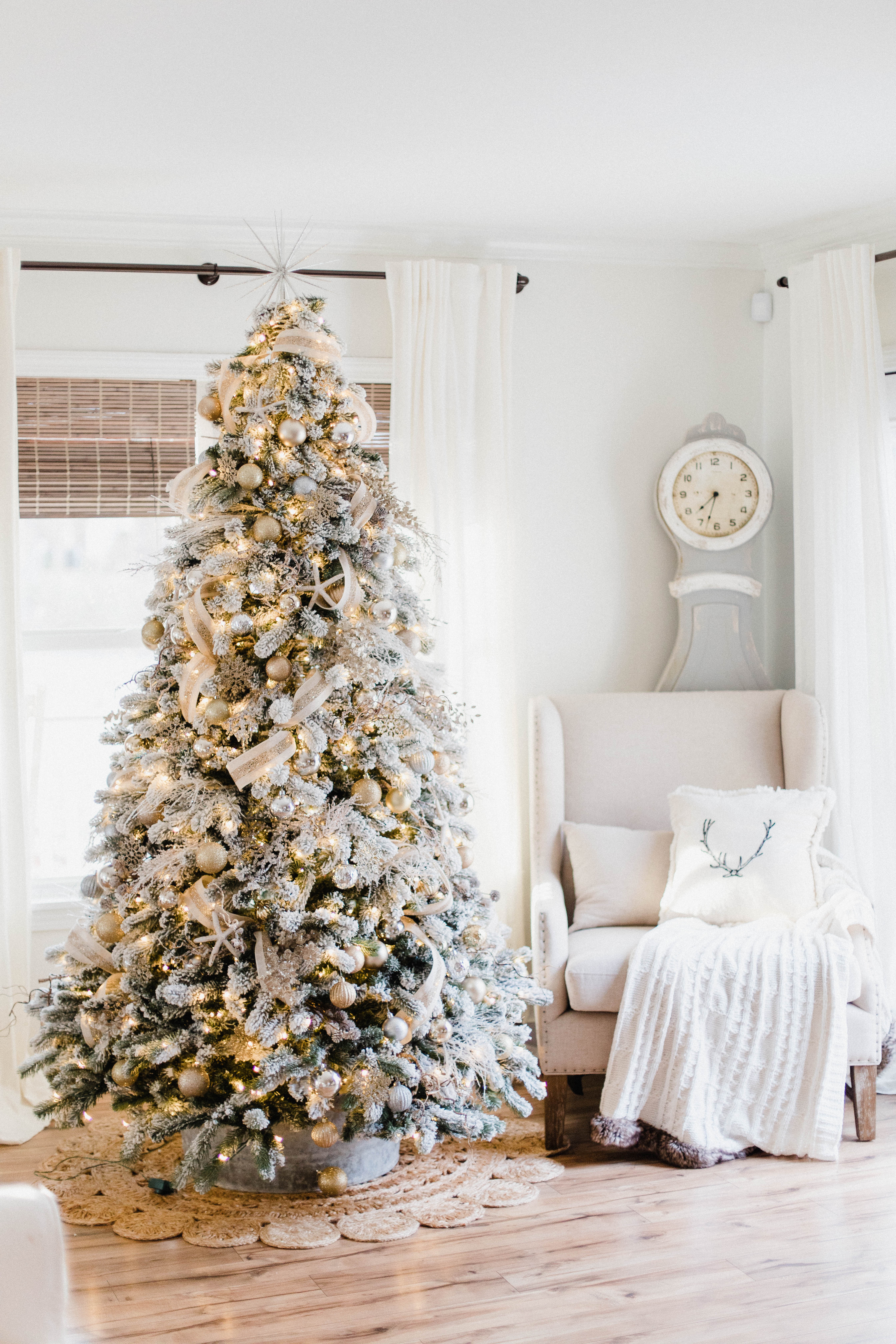 Connecticut life and style blogger Lauren McBride shares her Christmas Cottage Living Room for the 2018 Christmas season.