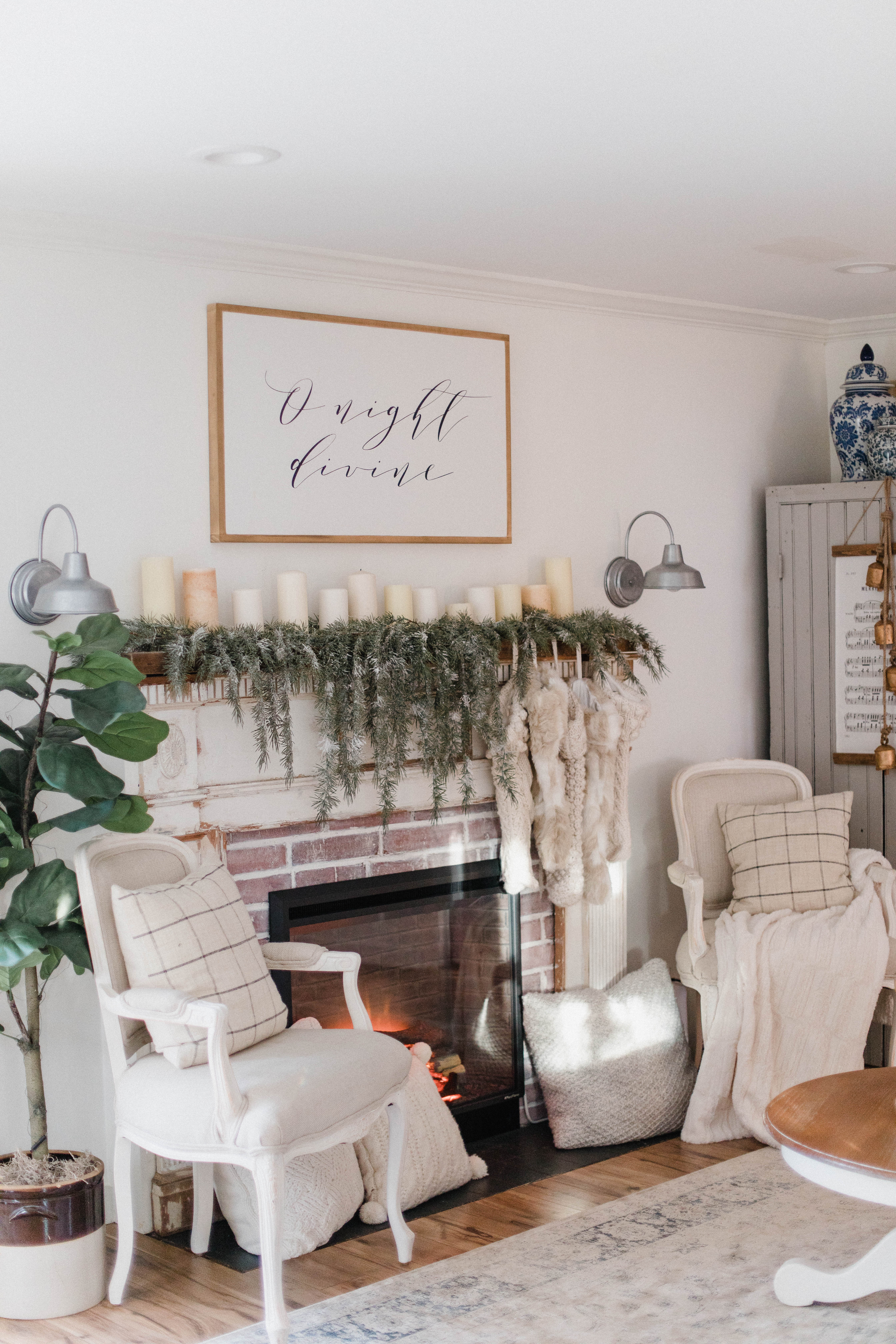 Connecticut life and style blogger Lauren McBride shares her Christmas Cottage Living Room for the 2018 Christmas season.