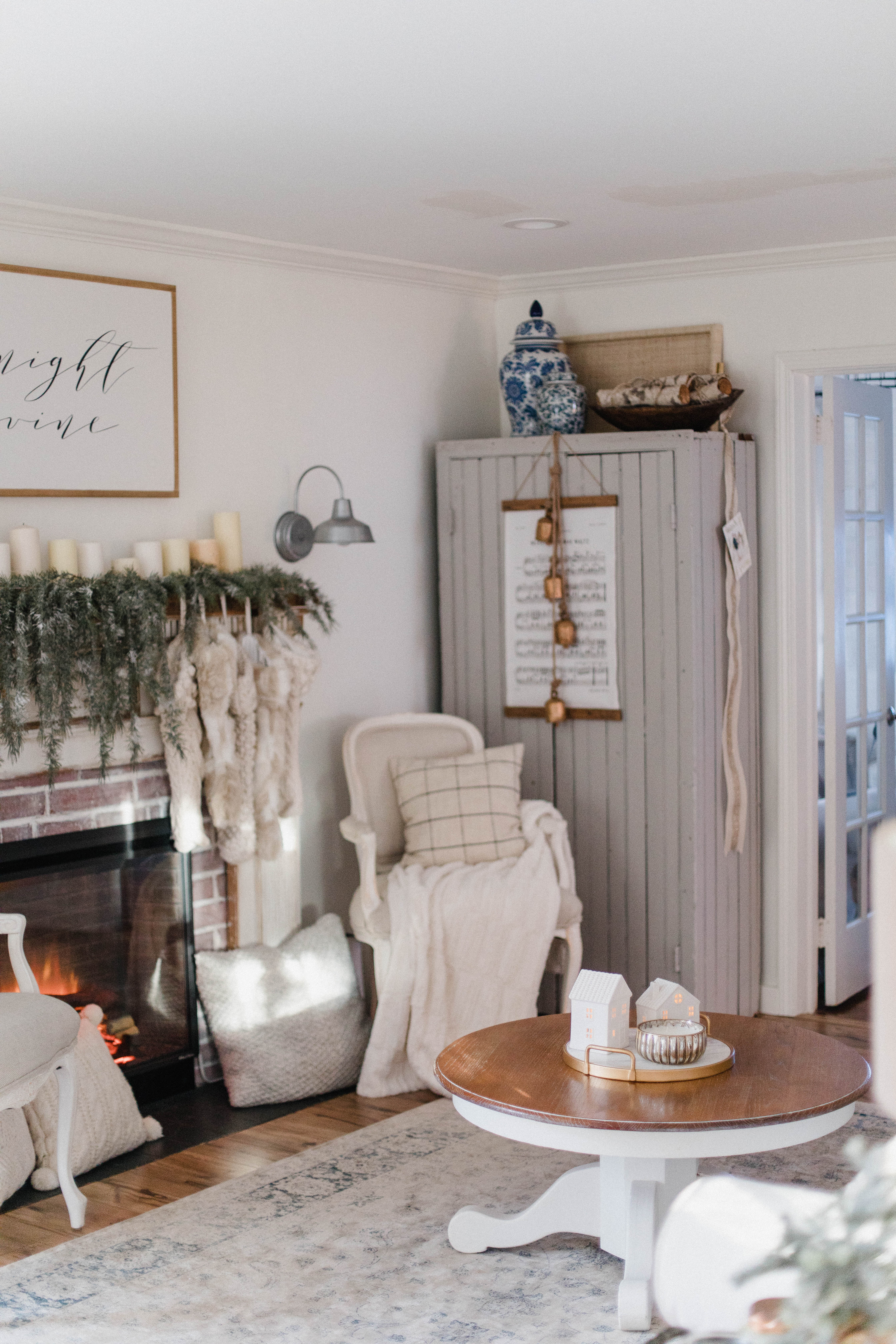 Connecticut life and style blogger Lauren McBride shares her Christmas Cottage Living Room for the 2018 Christmas season.