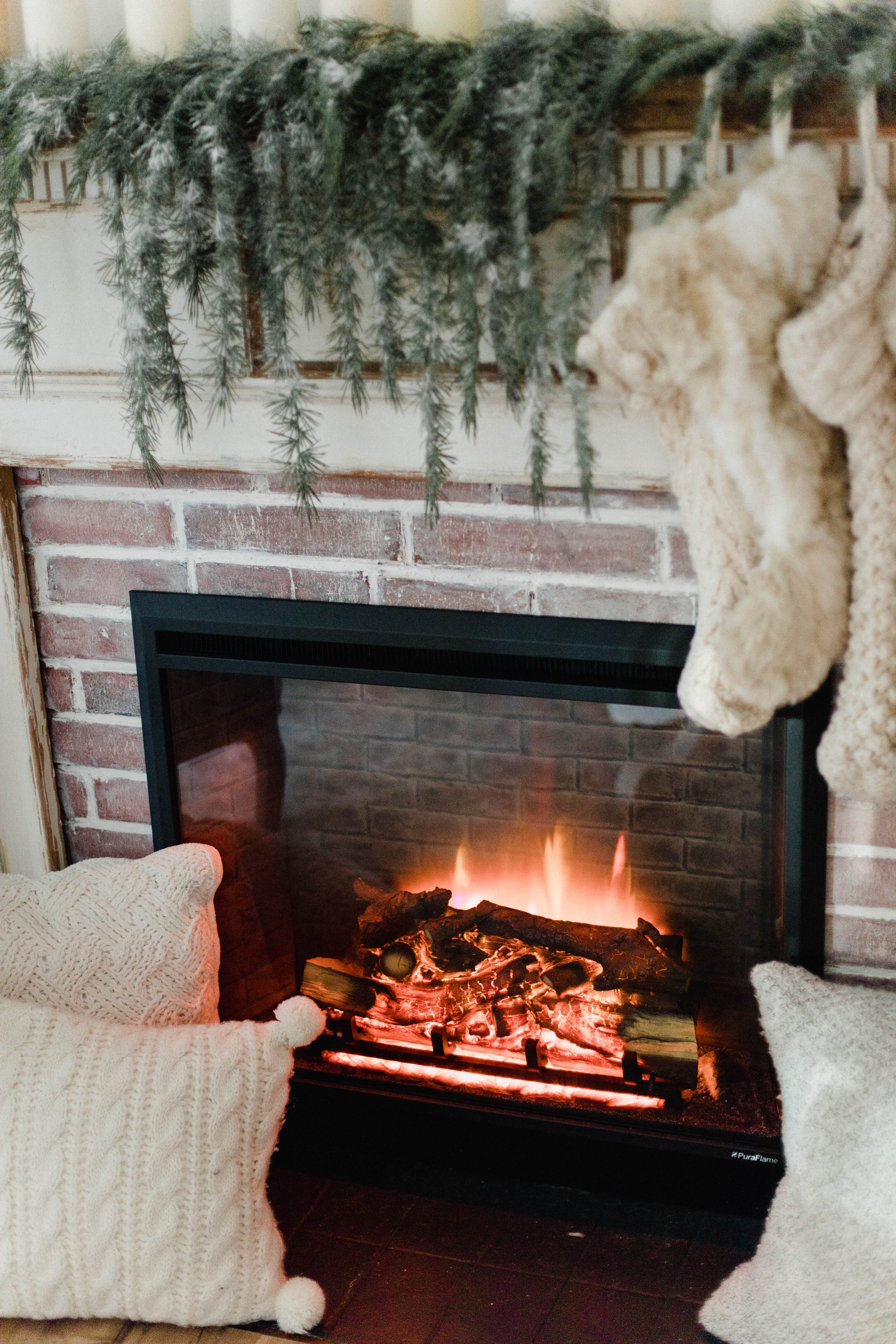 Connecticut life and style blogger Lauren McBride shares her Christmas Cottage Living Room for the 2018 Christmas season.