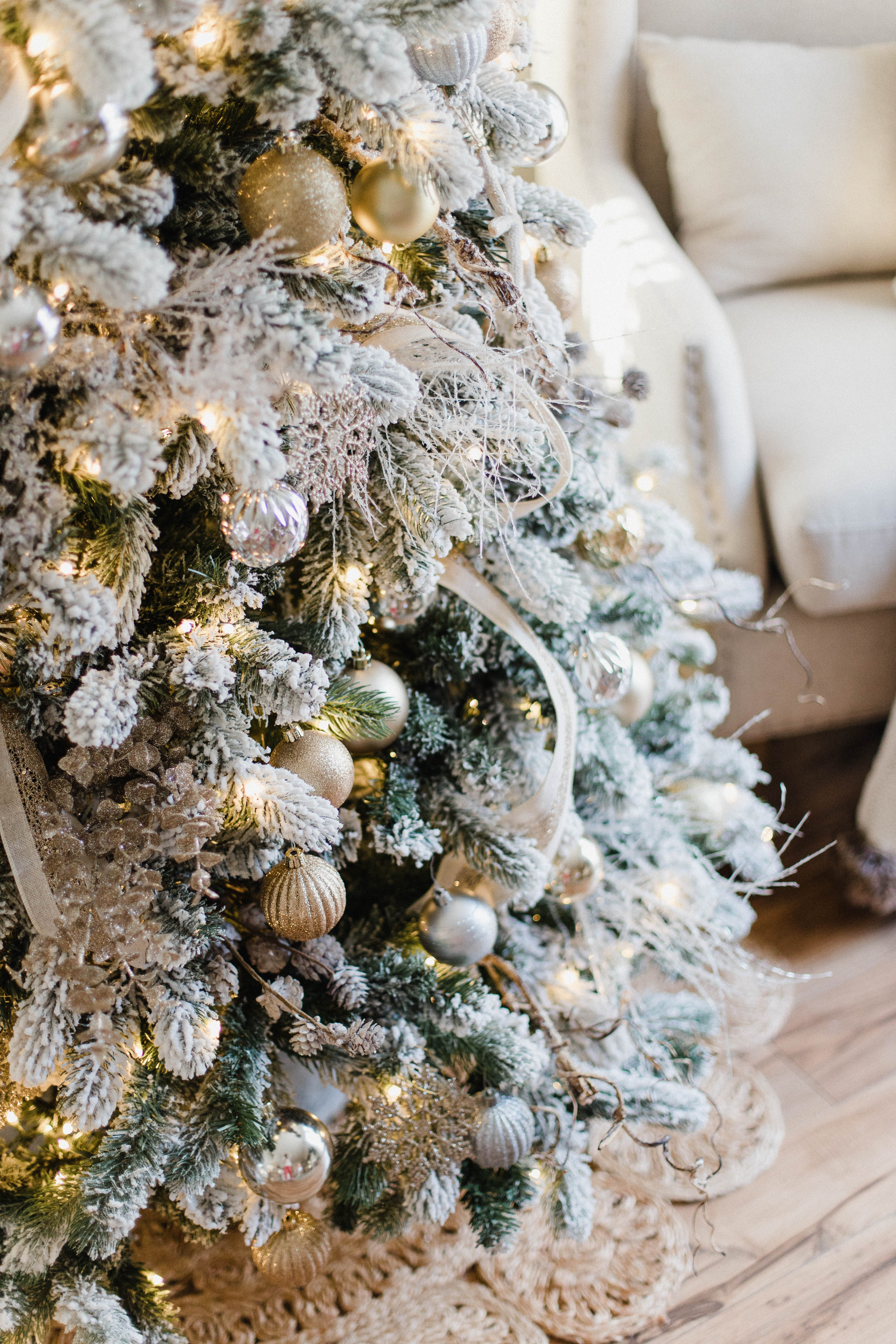 Connecticut life and style blogger Lauren McBride shares her Christmas Cottage Living Room for the 2018 Christmas season.