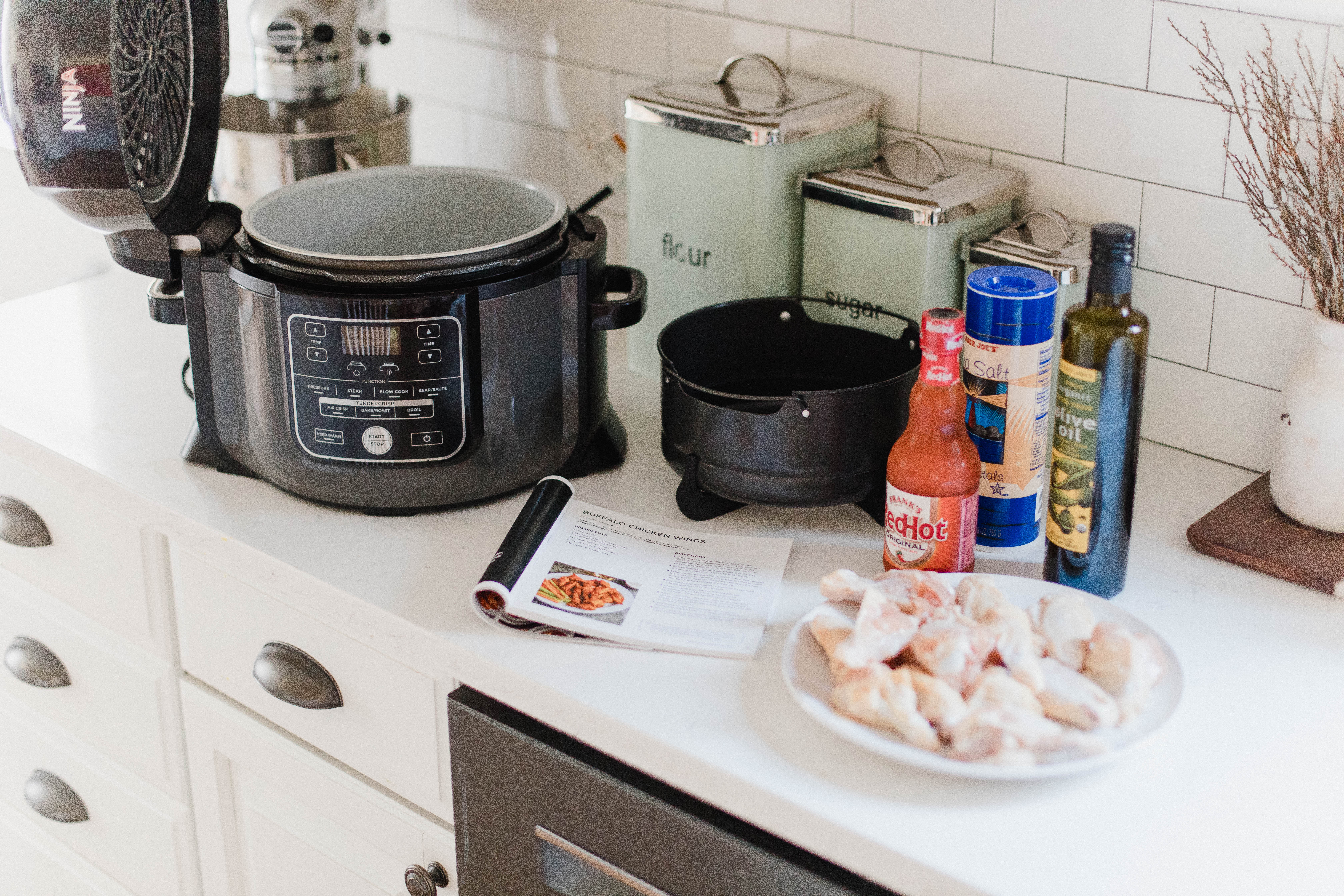 Connecticut life and style blogger Lauren McBride shares her paleo hot wing recipe using the Ninja Foodi two in one pressure cooker and air fryer.