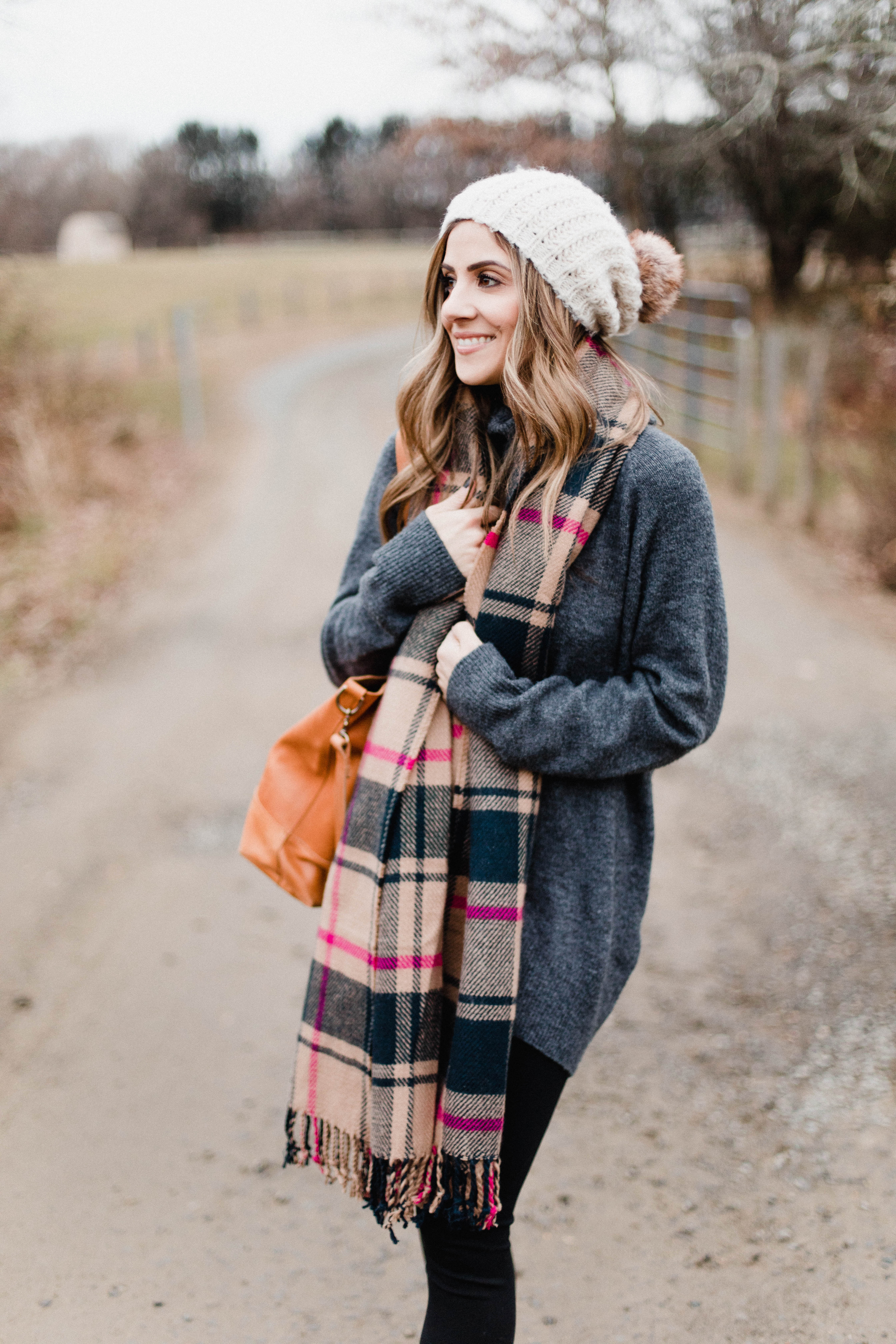 Connecticut life and style blogger Lauren McBride shares how to style low cut booties with socks for the fall and winter seasons.