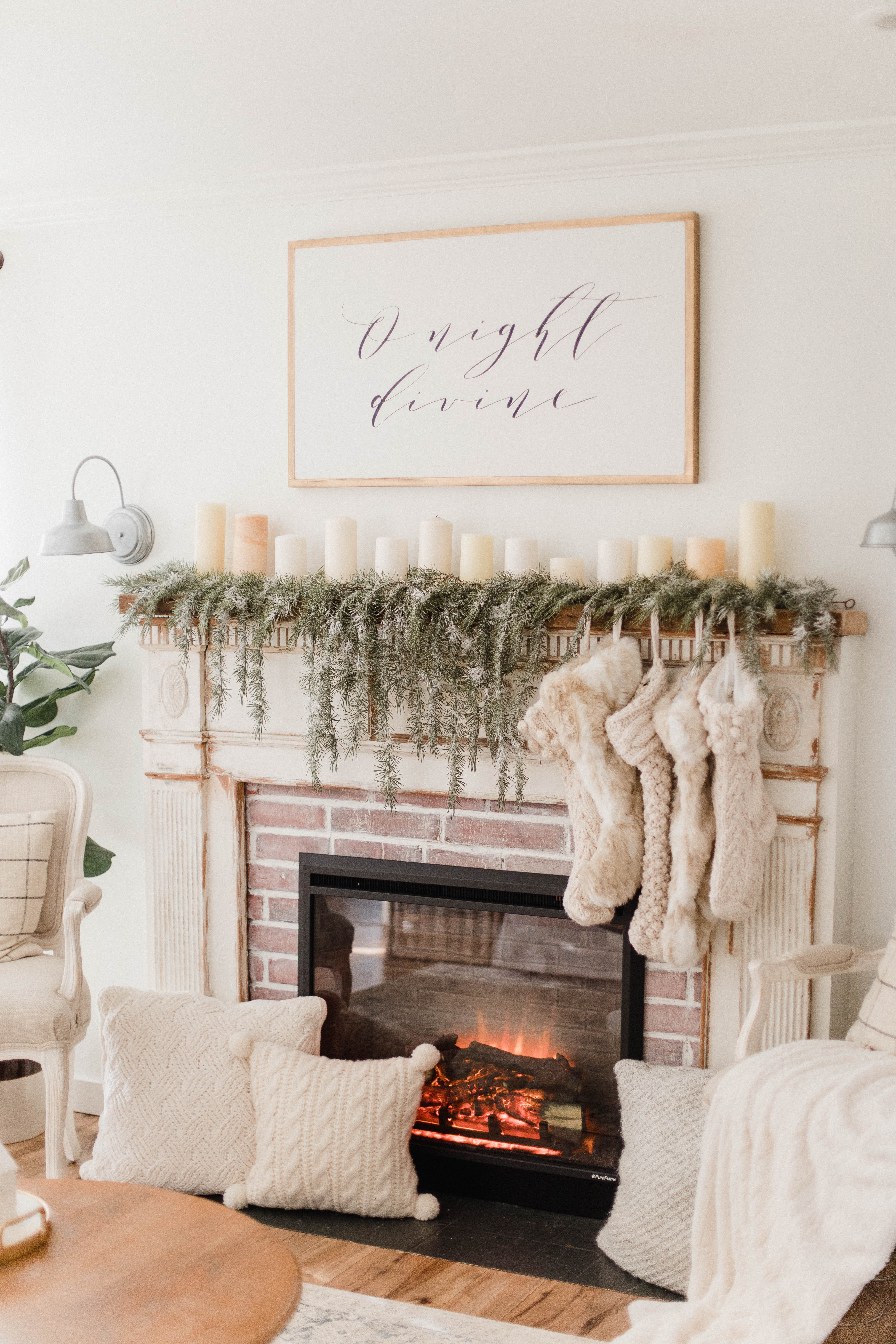 Connecticut life and style blogger Lauren McBride shares about the installation of an electric fireplace in her home and the benefits vs. a real fireplace.