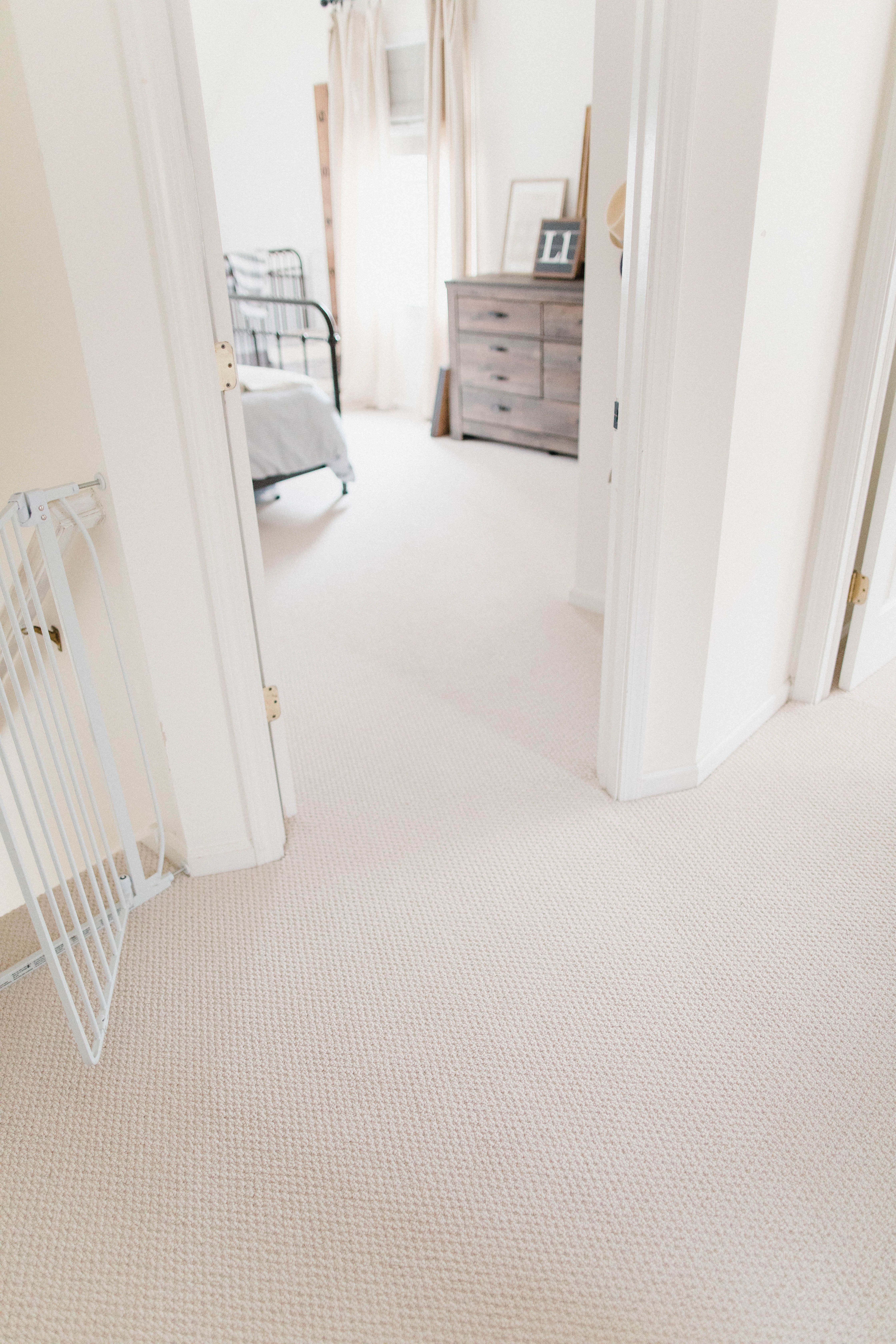 Connecticut life and style blogger Lauren McBride shares why she installed wall to wall carpeting in the upstairs of her home, including facts on the benefits of carpeting.