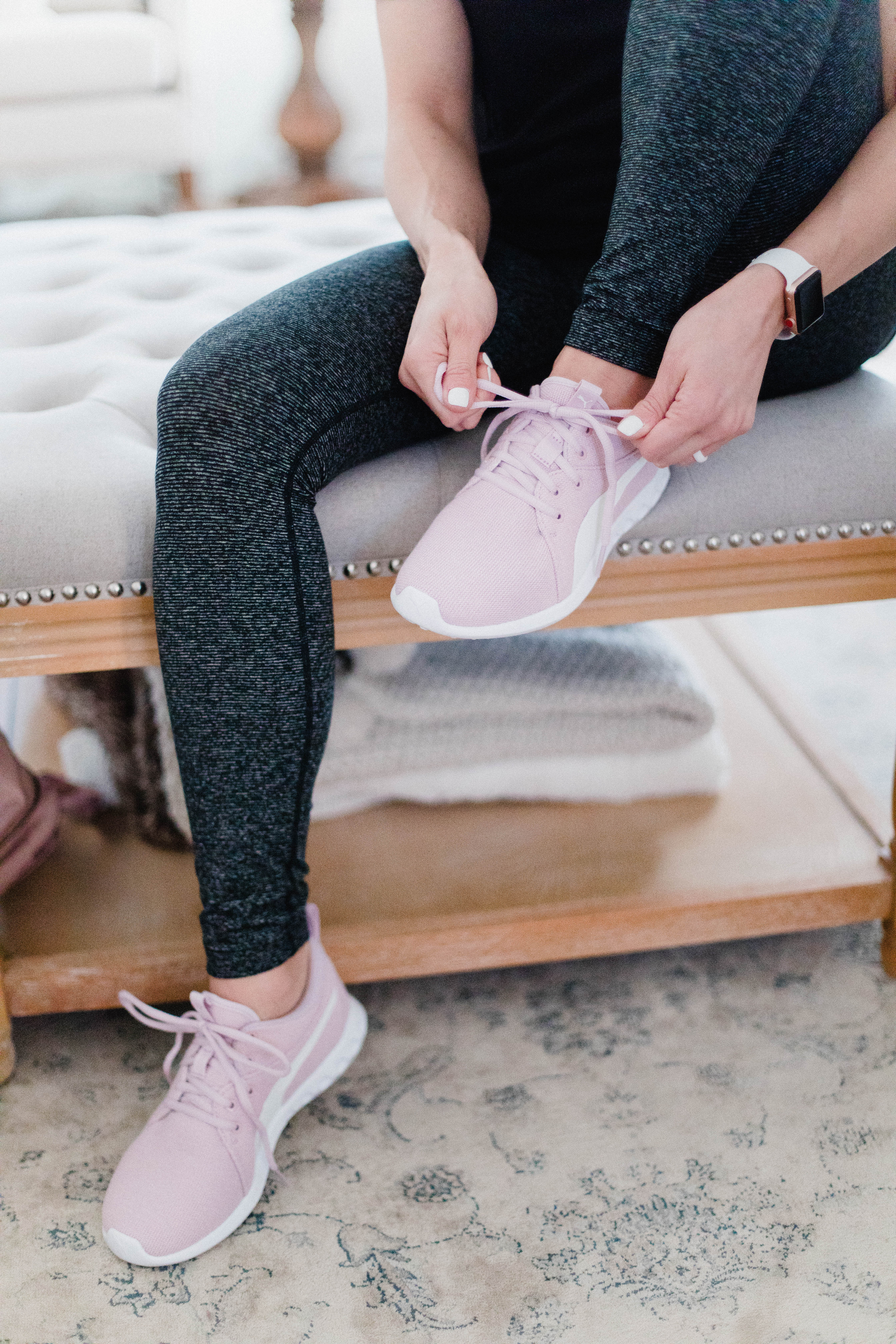 Connecticut life and style blogger Lauren McBride shares her fitness essentials for the new year, including wireless headphones, meal prepping containers, and a fitness tracker.